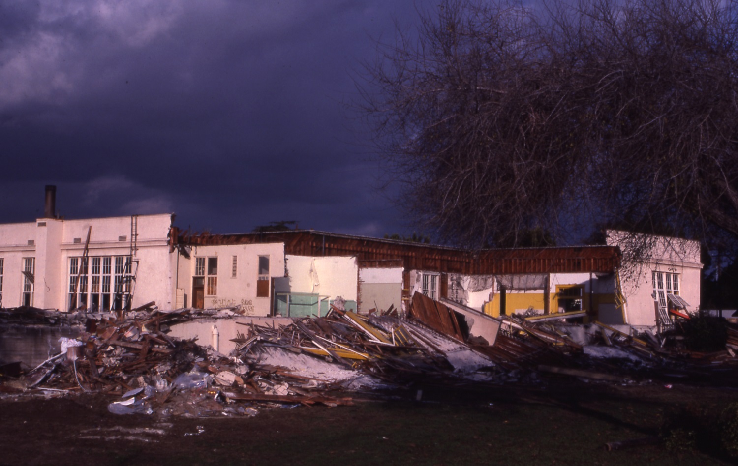 A colored photo of the demolished Ford Elementary School in 1984.