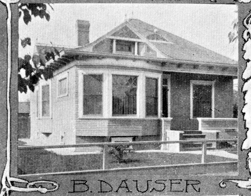 A black and white photograph of the exterior of the Ben Dauser House in 1904.