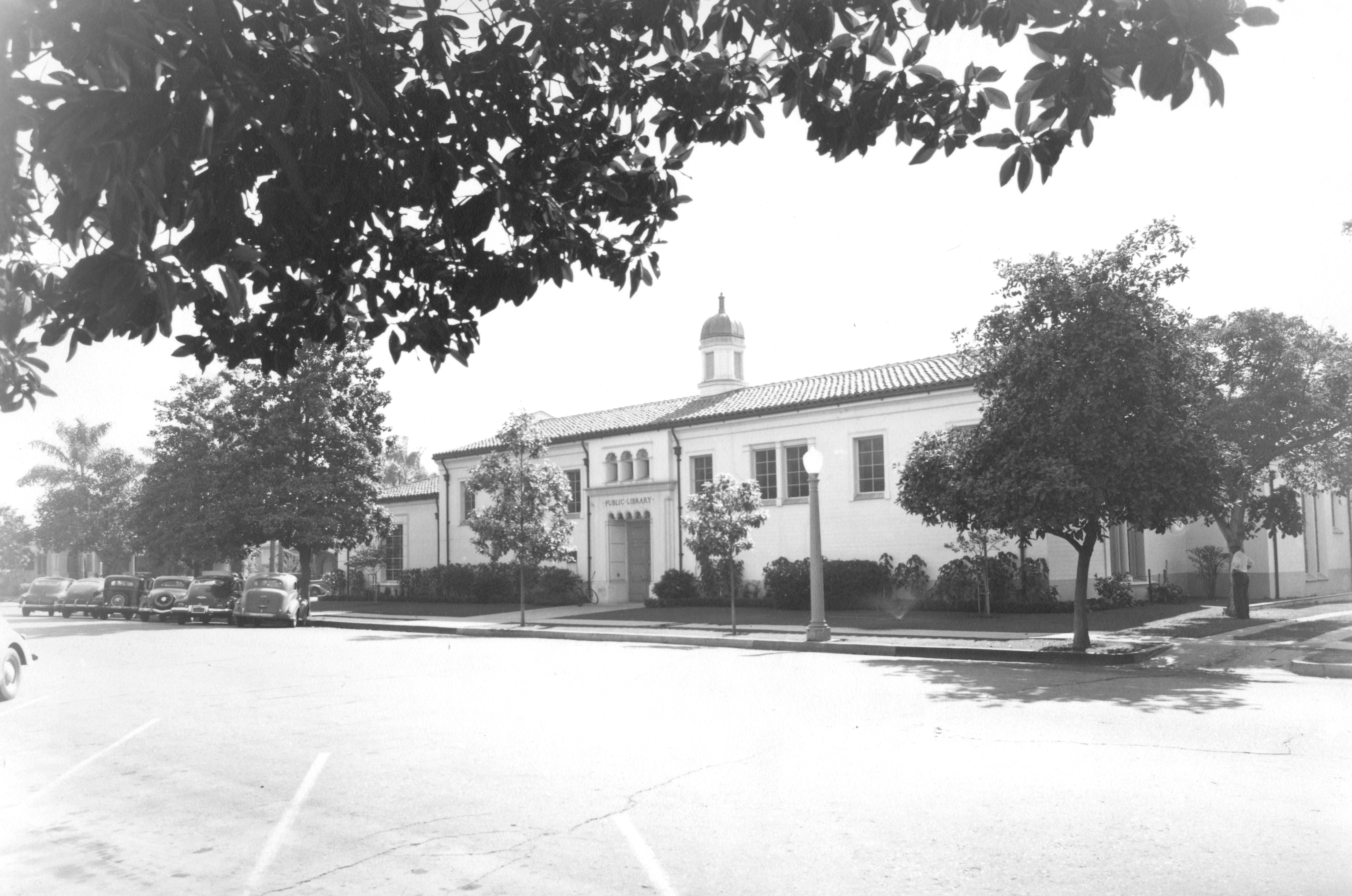 A black and white photograph of the Fullerton Library&#039;s entrance on the east side of the building, taken in 1942.