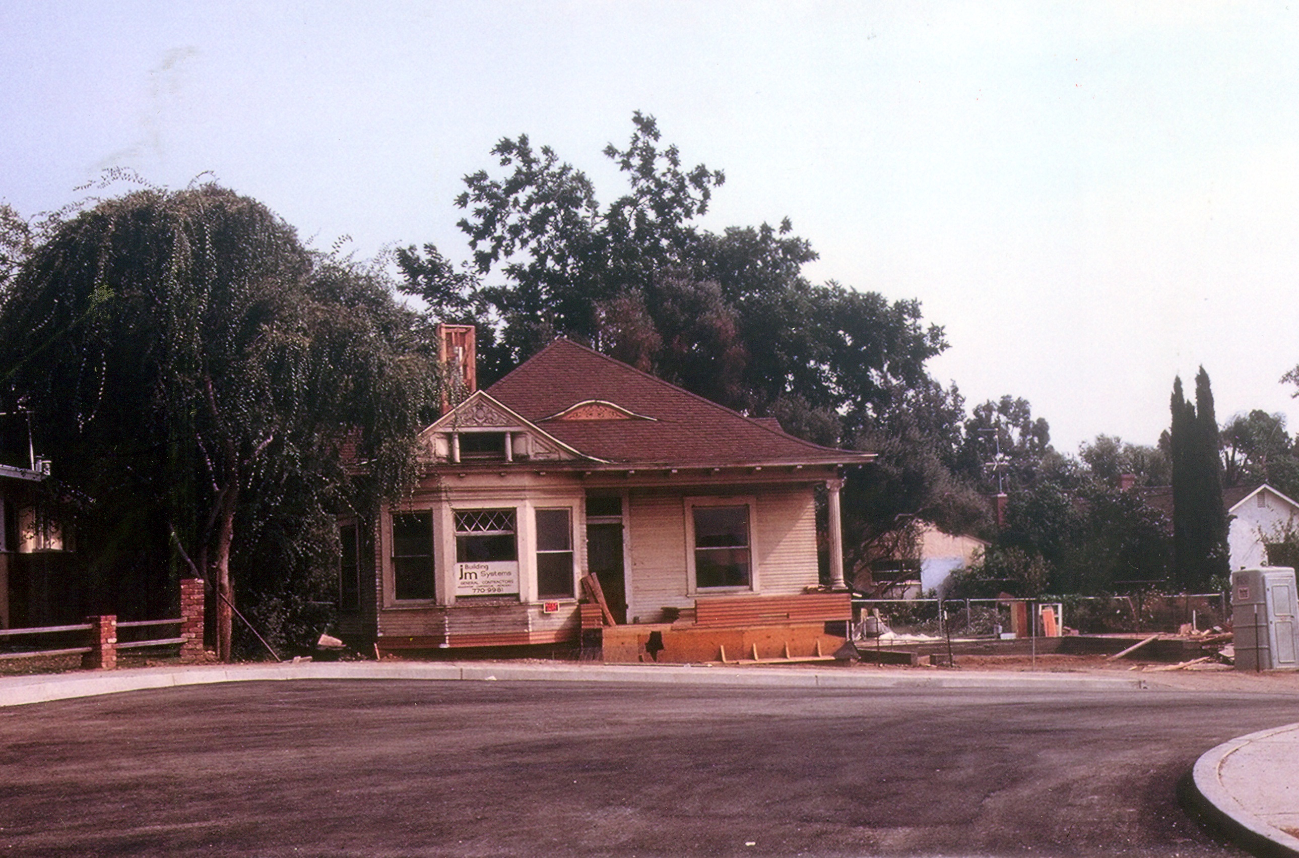 A colored photo of the Ben Dauser House after it had been moved to its Barris Drive location in 1982.