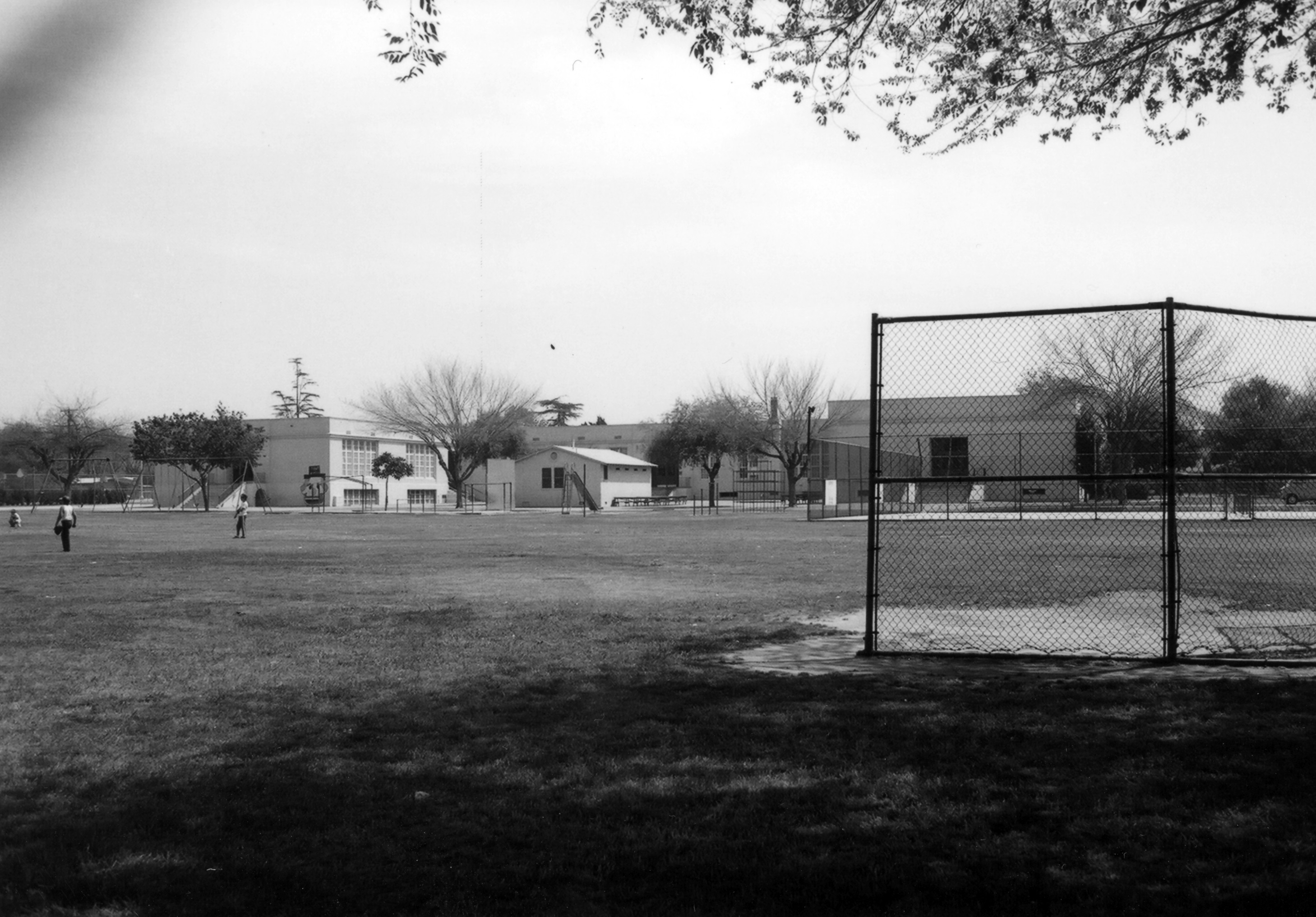 A black and white photograph of Ford Elementary School&#039;s grounds from the rear in 1978.
