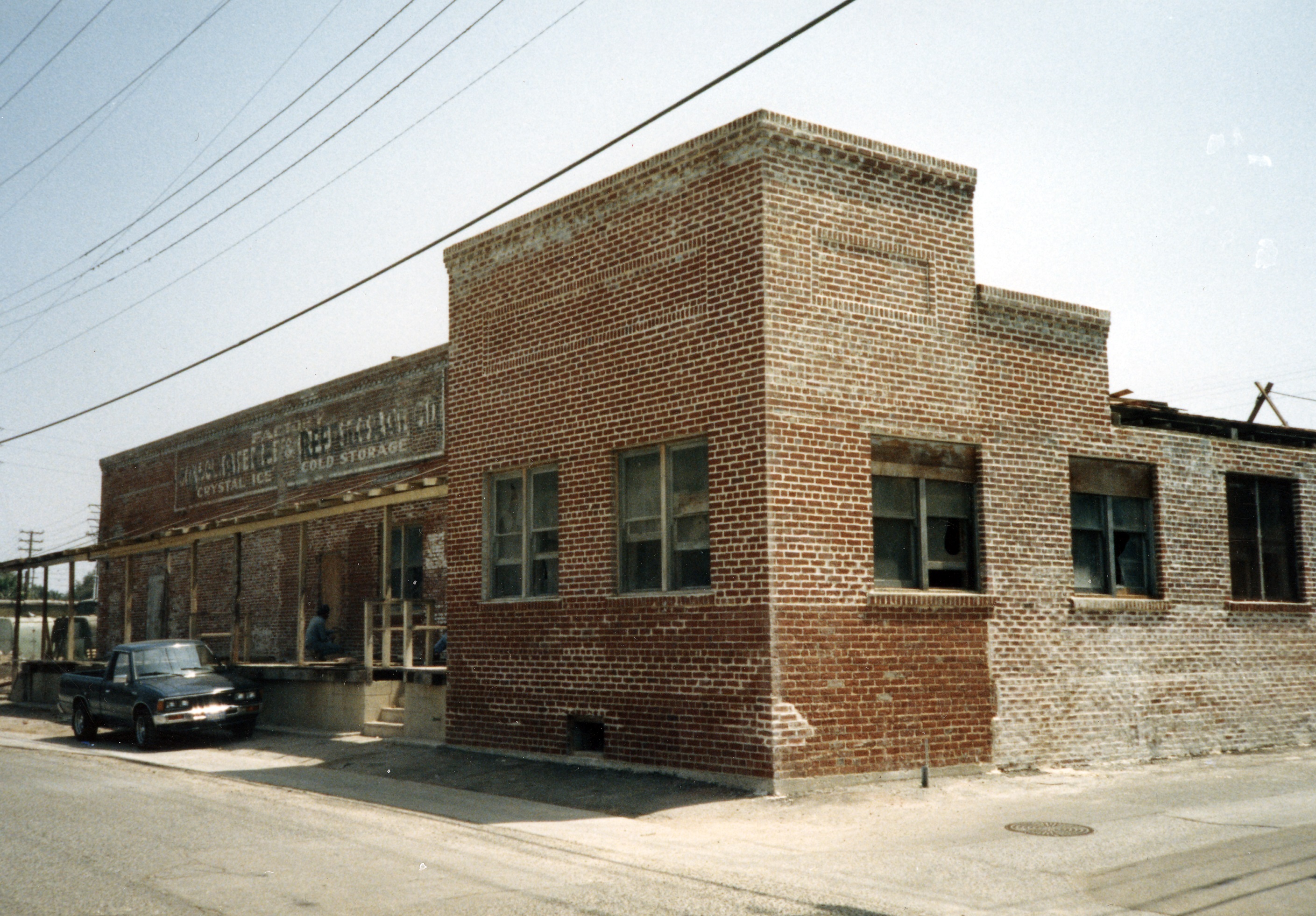 A colored photo of the Crystal Ice House&#039;s exterior during rehab in 1986.