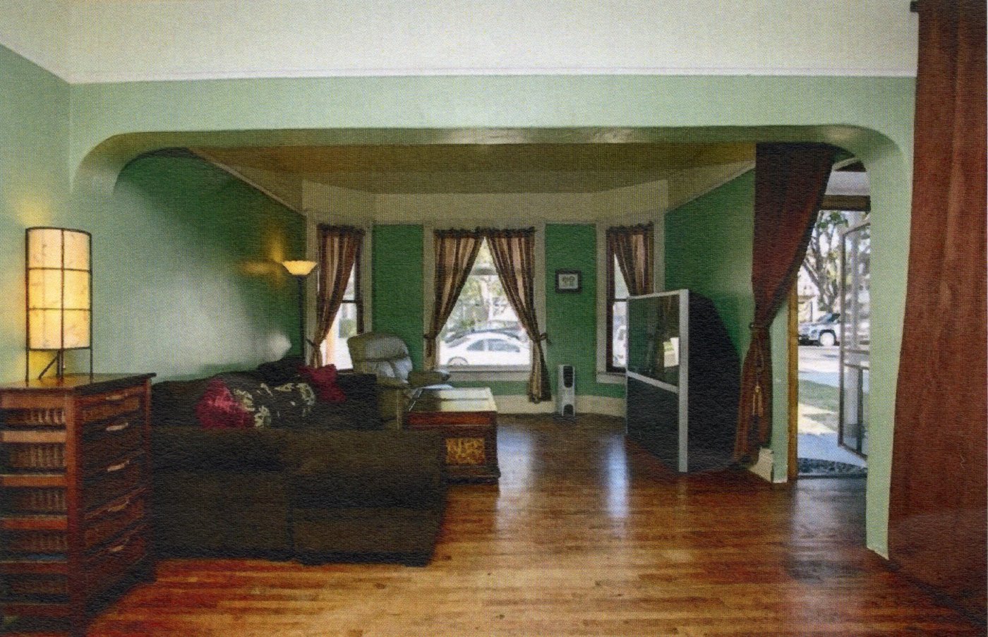 A colored photo of the interior living room of the Charles Ruddock House in 2017.