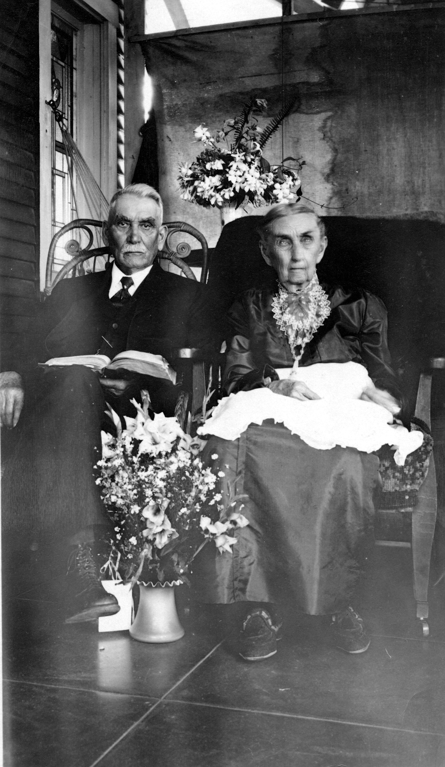 A black and white photograph of Reverend Francis Holcomb and his wife.