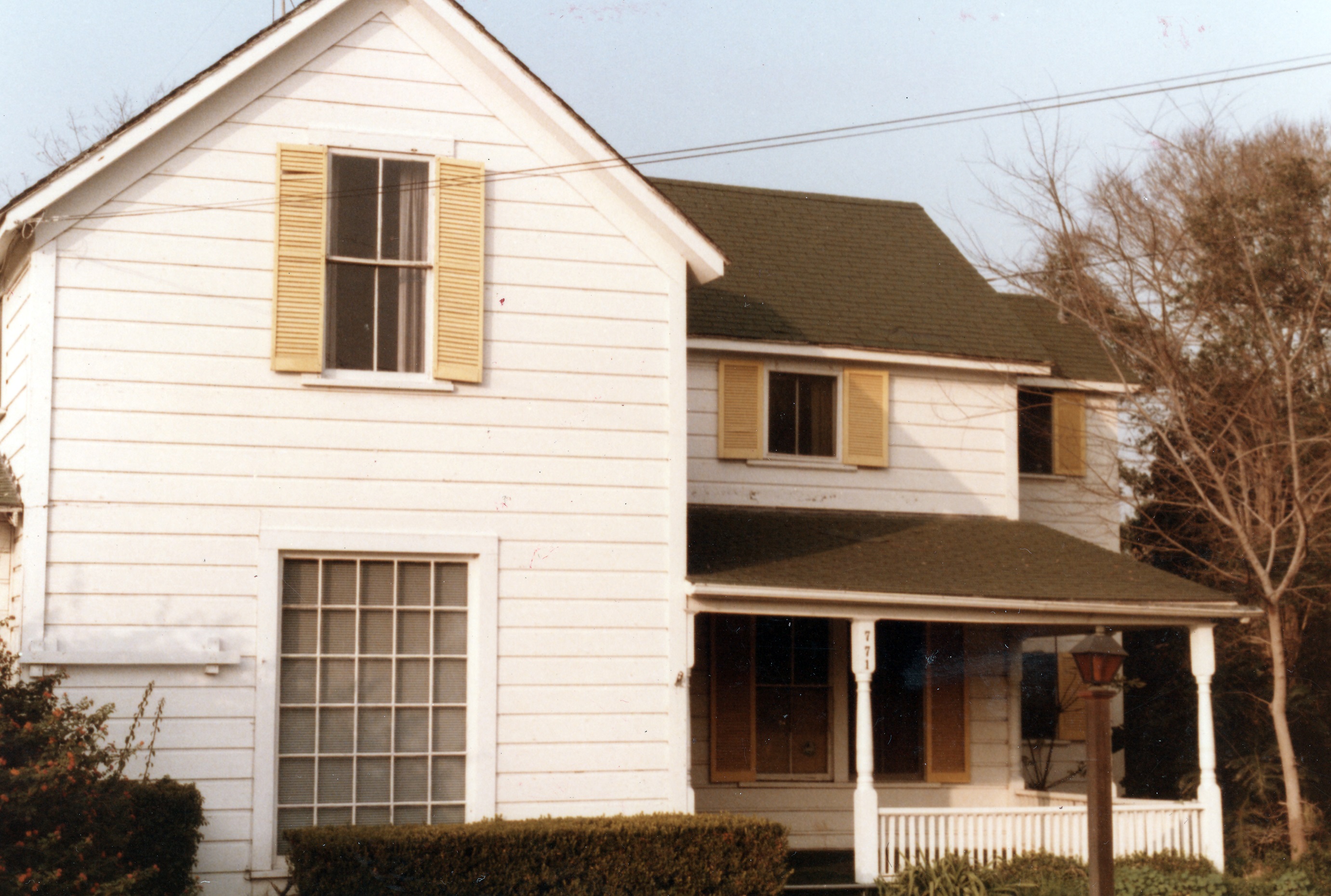 A colored photo of the exterior of the John Kerr House in 1984.