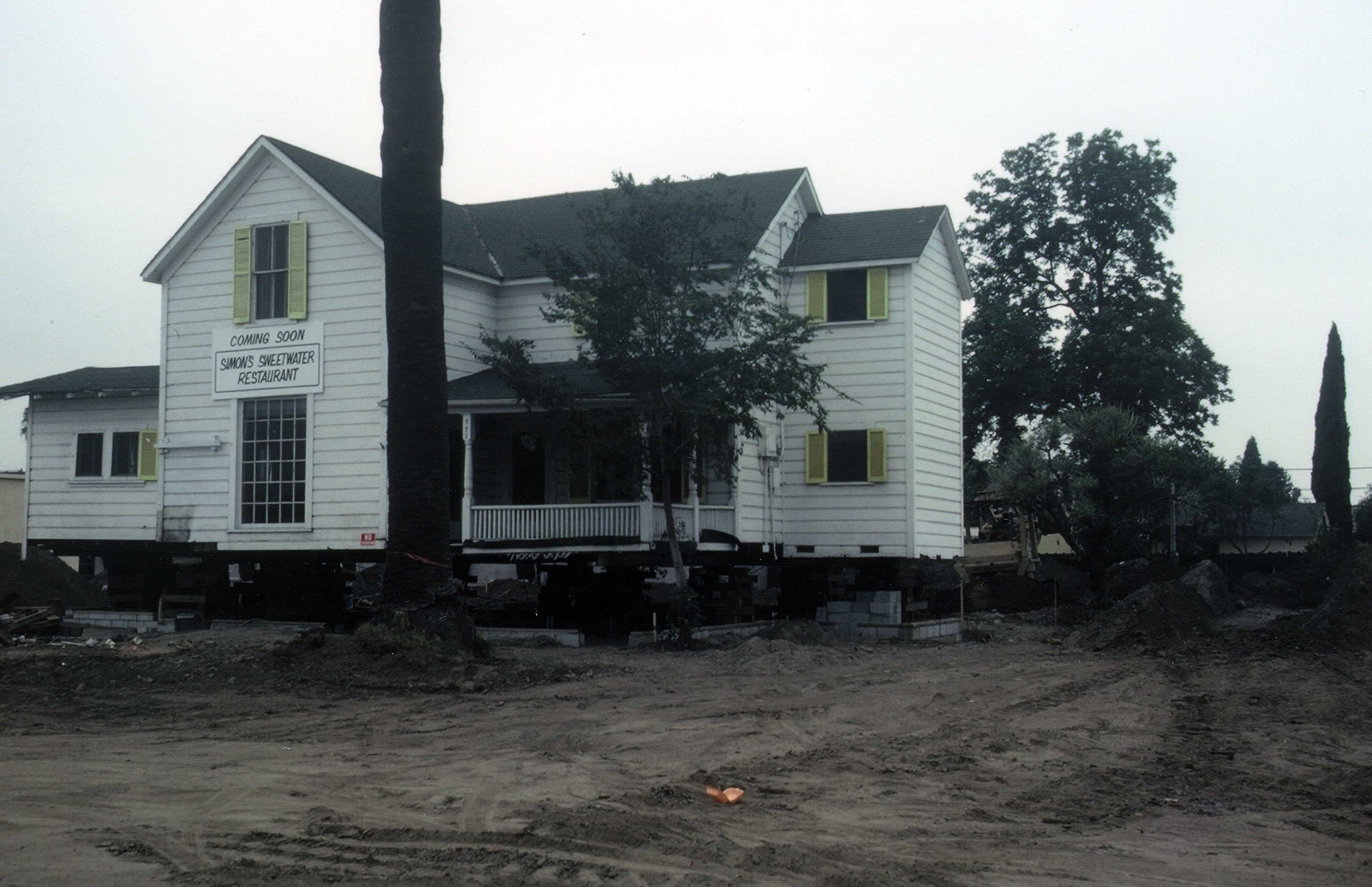 A colored photo of the the John Kerr House being remodeled for the restaurant in 1984.
