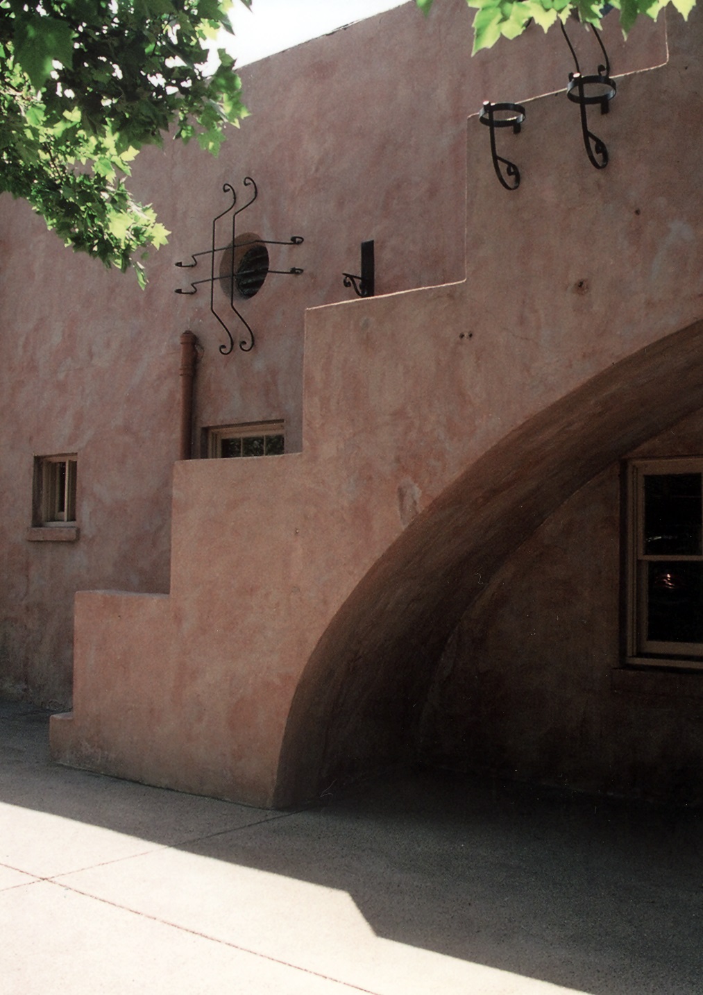 A colored photo of the architectural details of the Santa Fe Railway Passenger &amp; Freight Depot in 2021.