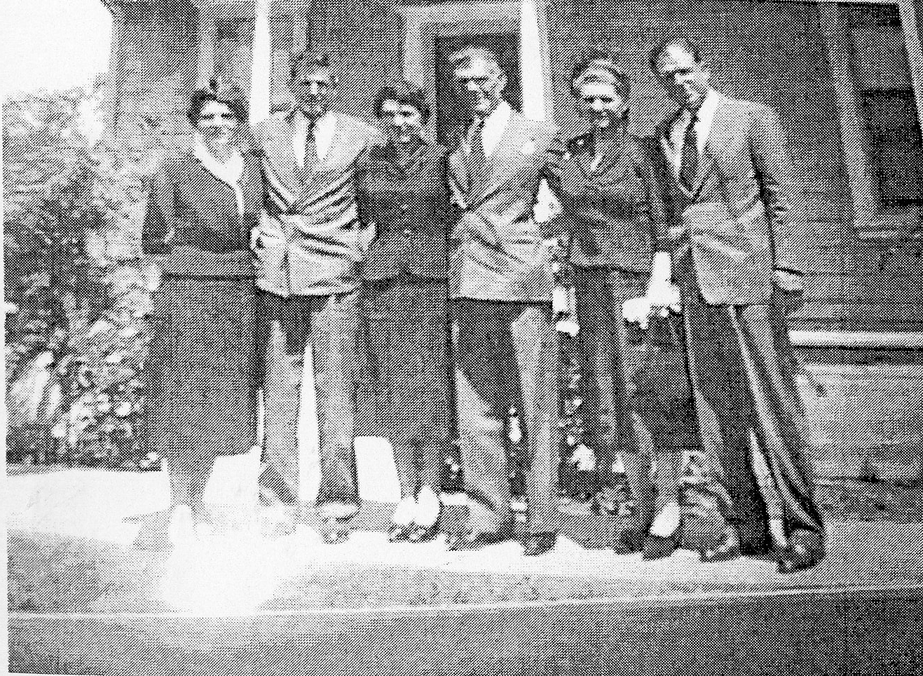 A black and white photograph of six members of the Noutary Family standing next to each other in 1947.