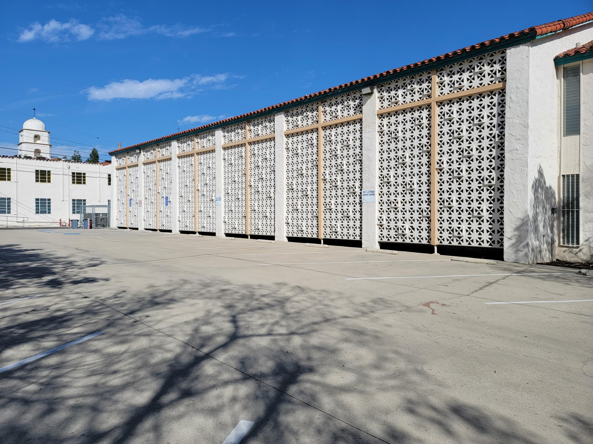 A colored photo of the brise soleil on the west side of the First Lutheran Church house in 2025.
