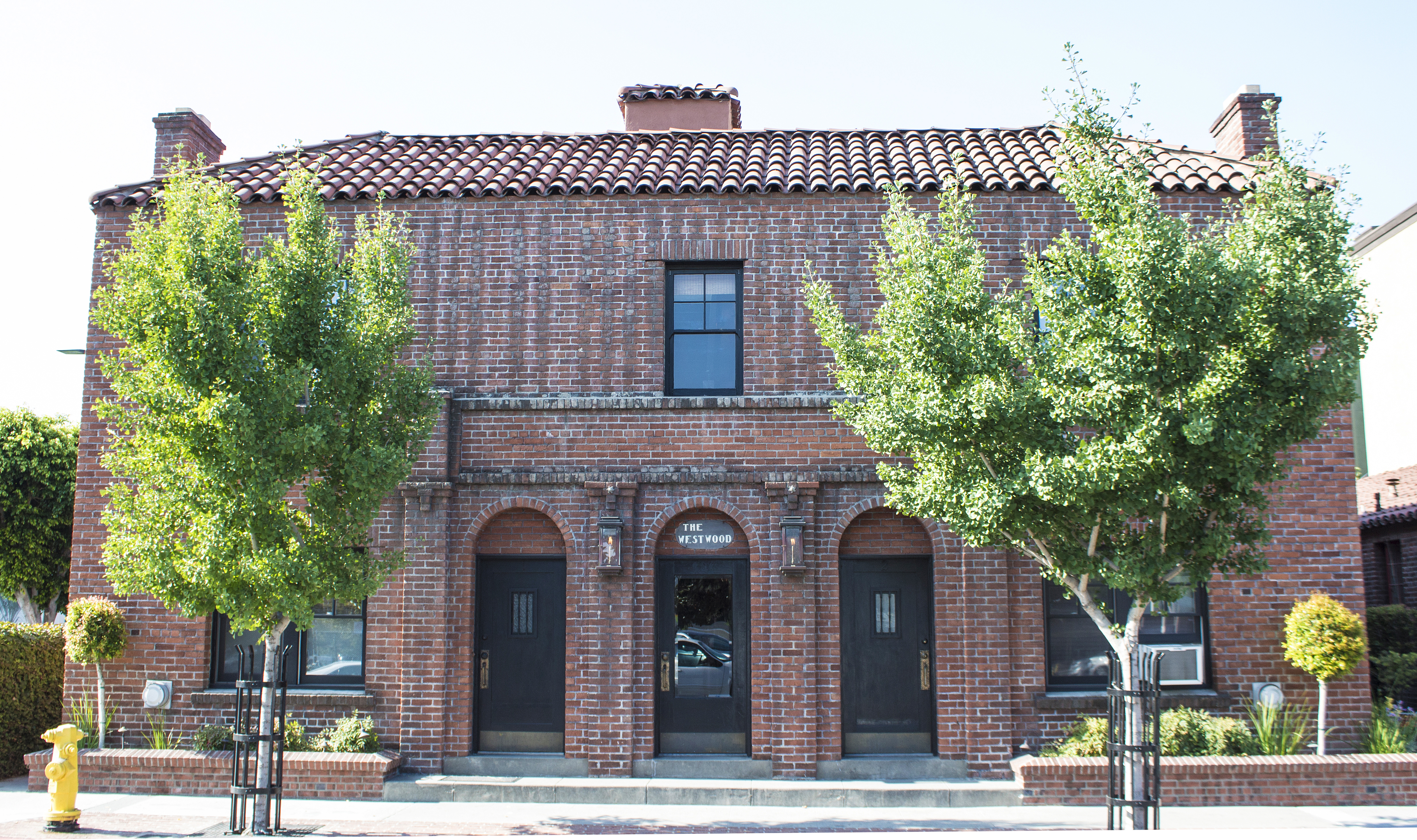 A colored photo of the Samuel Dunphy Apartments (now Westwood Apartments) in 2017.