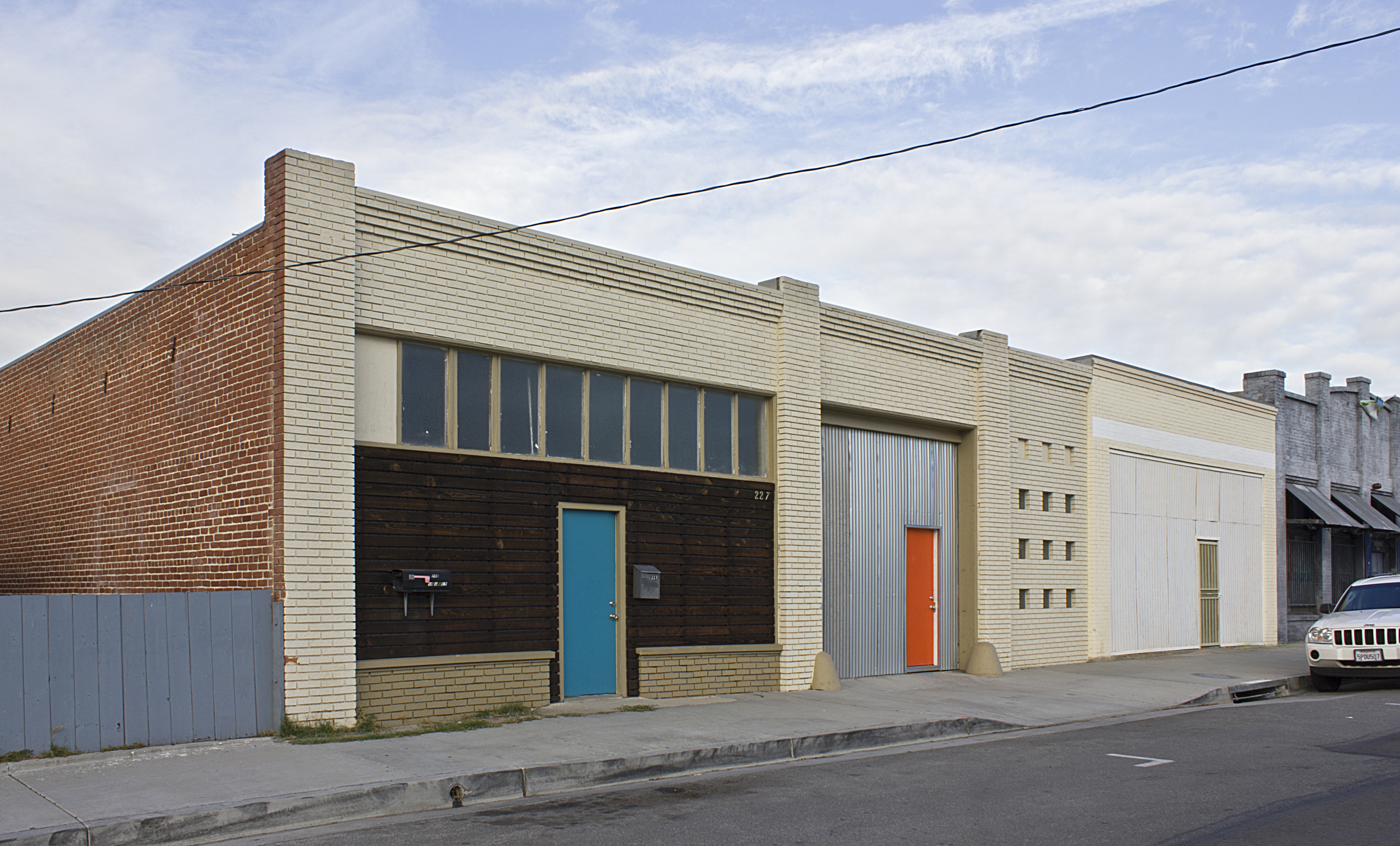 A colored photo of the Fullerton Dye Works building in 2017.