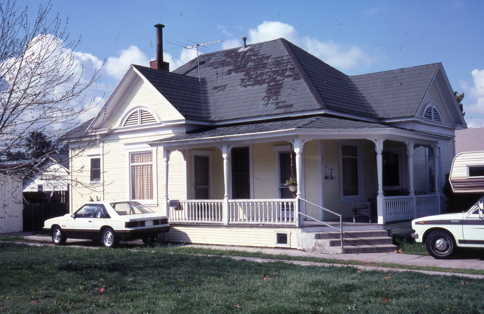 A colored photo of the east side exterior of the George Annin House in 1984.