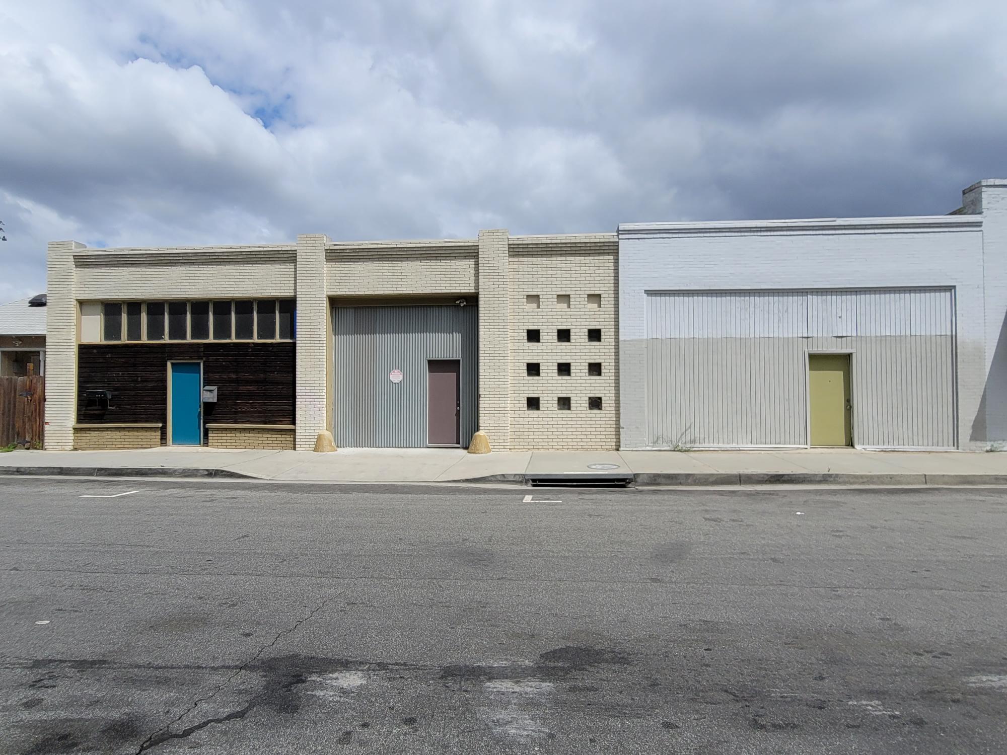 A colored photo of the exterior of the Fullerton Dye Works building in 2025.