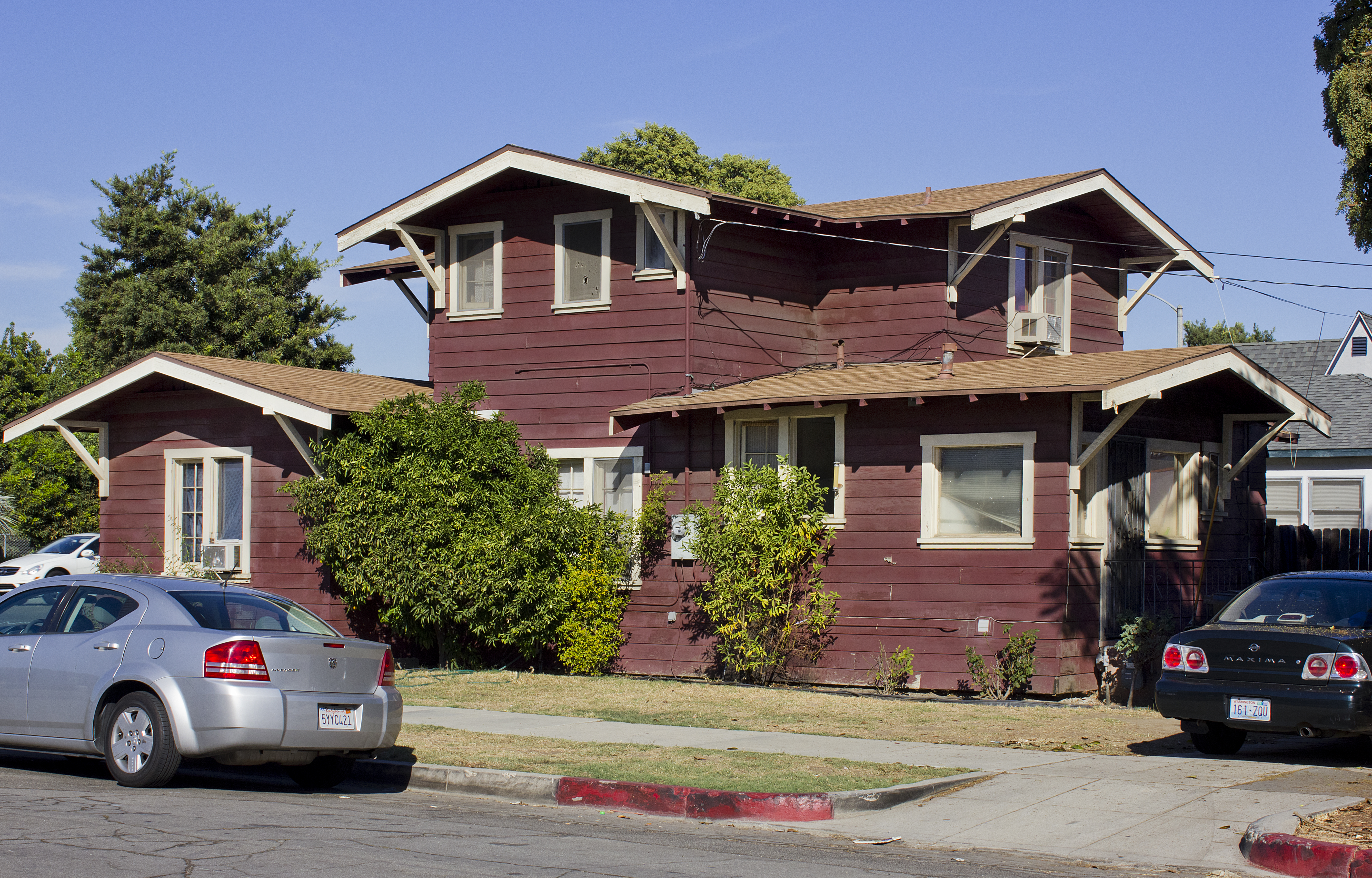 A colored photo of the exterior of the west side of the Albert Stuelke House in 2012.