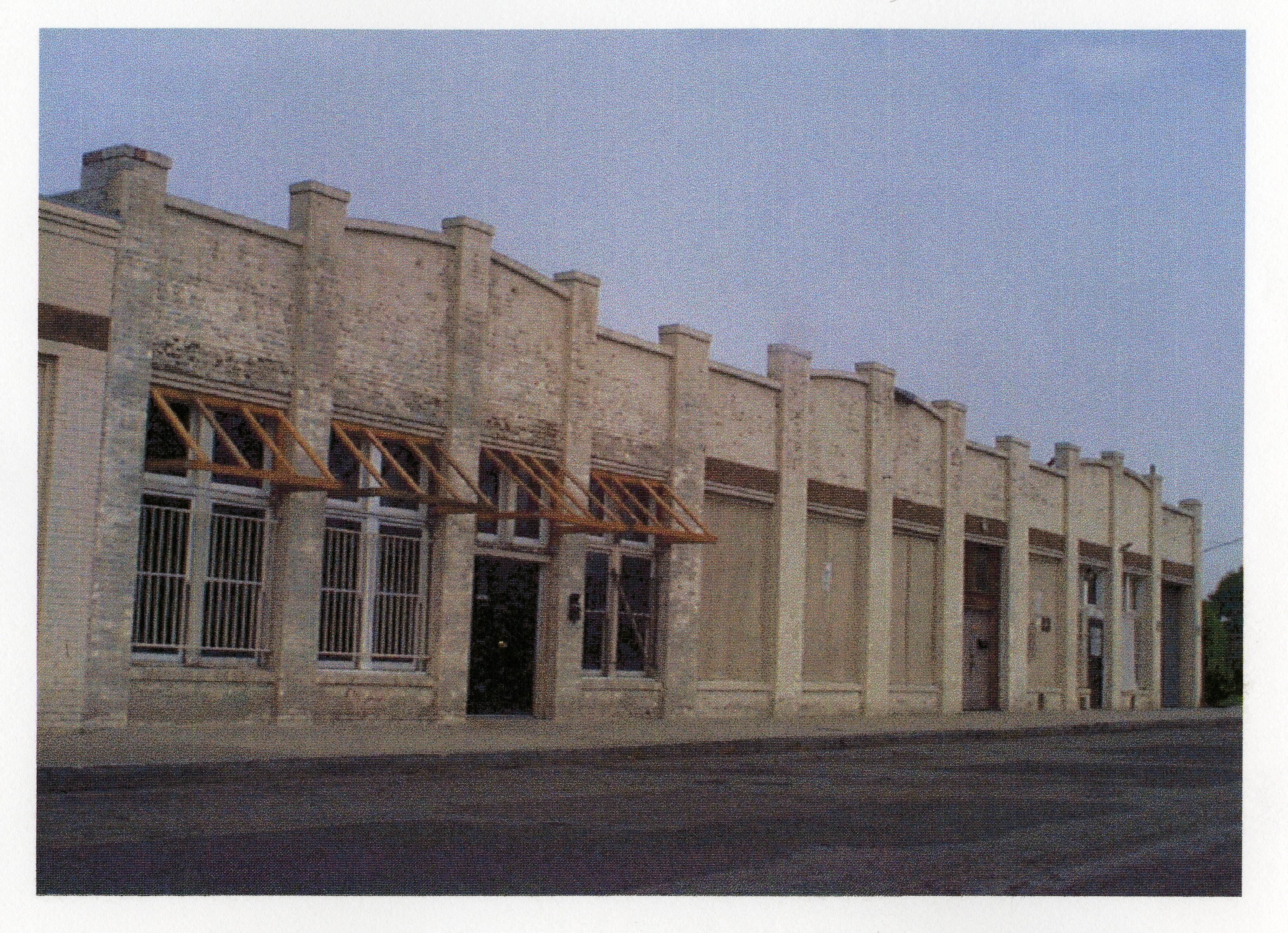 A colored photo of the Sanitary Laundry Building for Fullerton Through the Years in 2000.