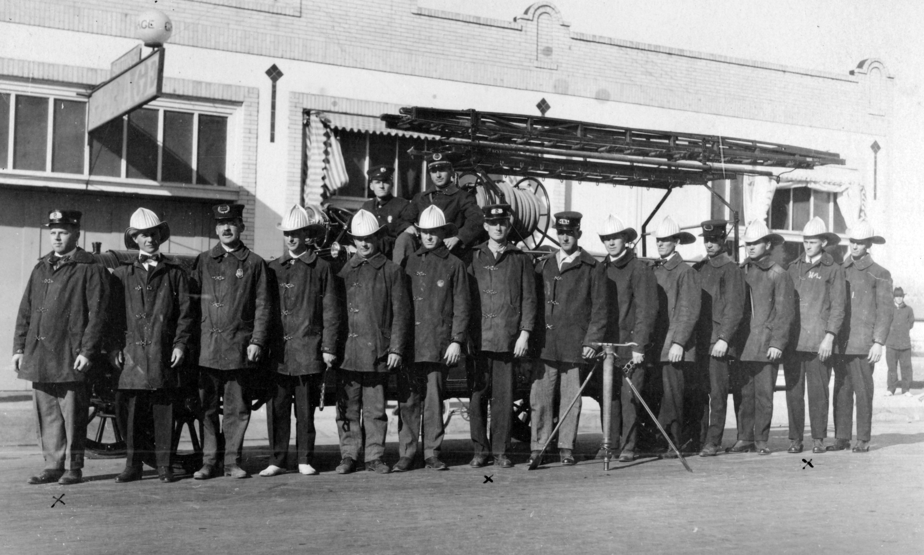 A black and white photograph of George Gobar as a firefighter, taken in 1915.