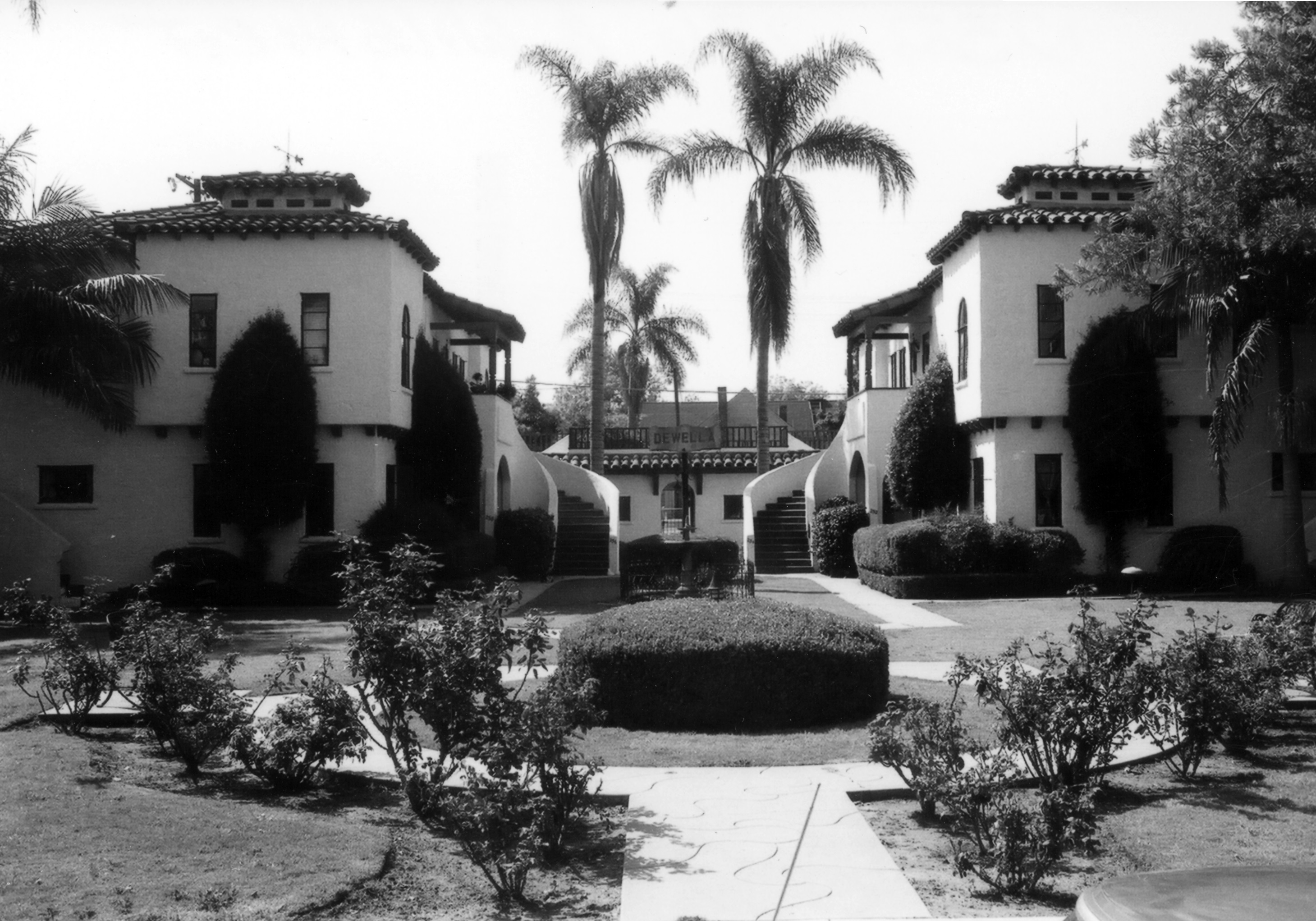 A black and white photograph of the Dewella Apartments for the Historical Building Survey in 1978.