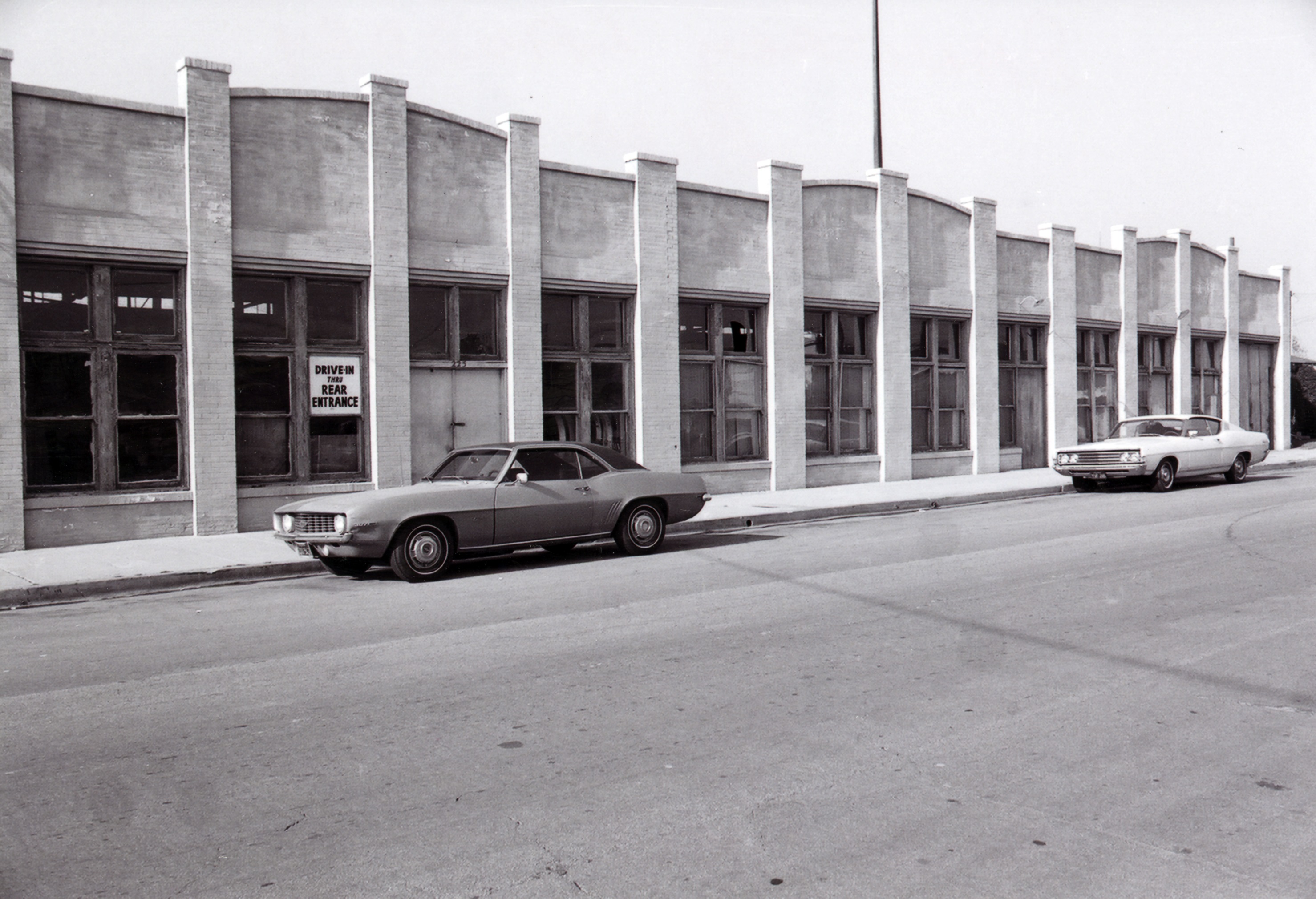 A black and white photograph of the Sanitary Laundry Building for the Historical Building Survey in 1978.