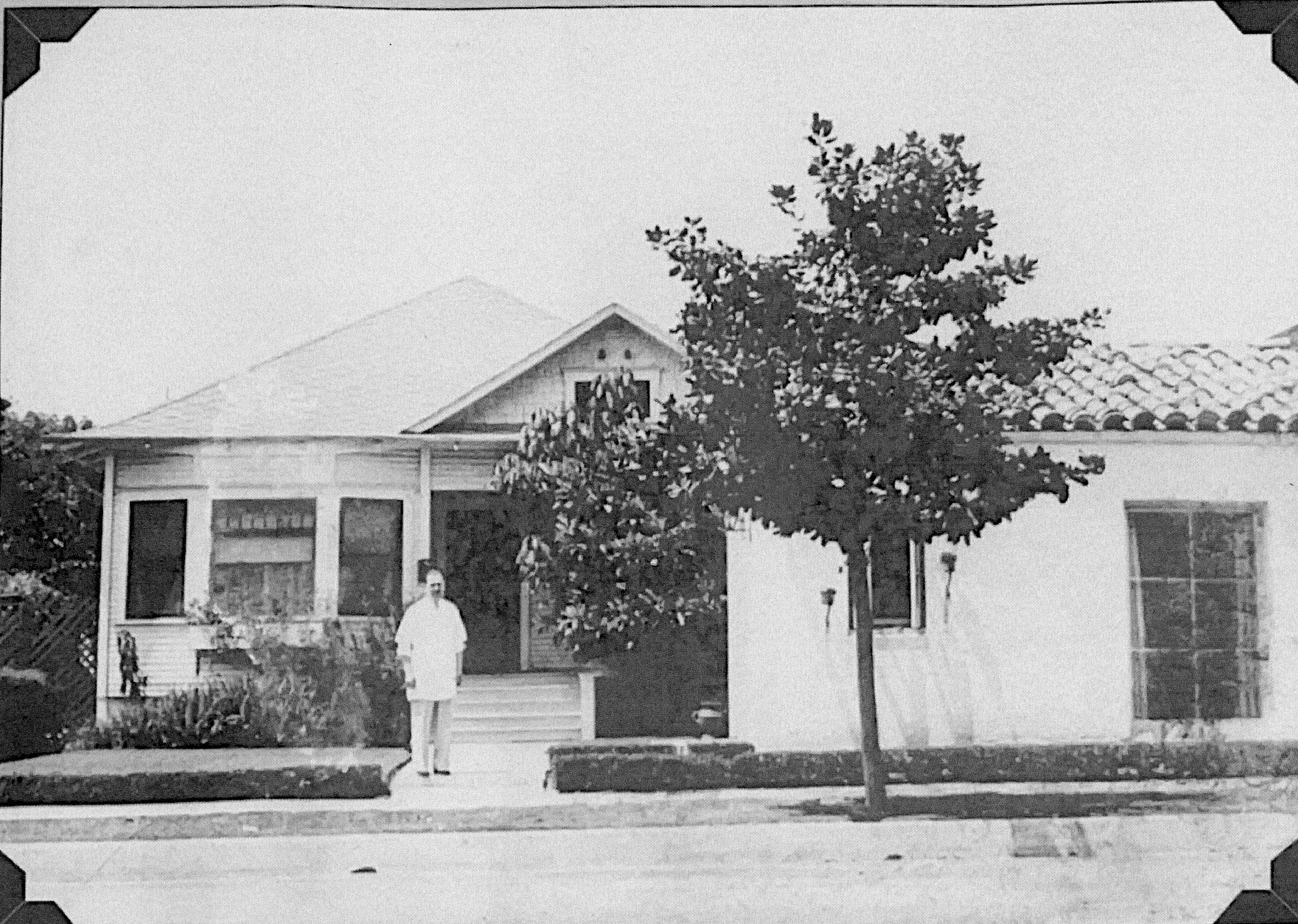 A black and white photograph of the original home and office for the Dr. Olson Home &amp; Medical Office.