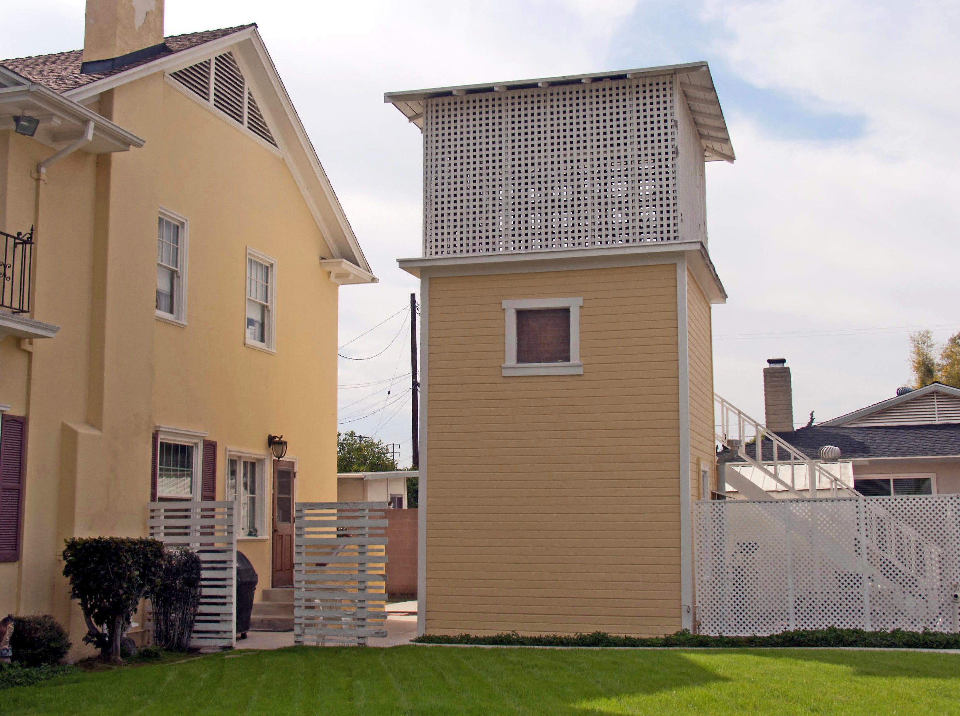 A colored photo of the Pump House, part of the Lilburn Gardiner House, in 2017.