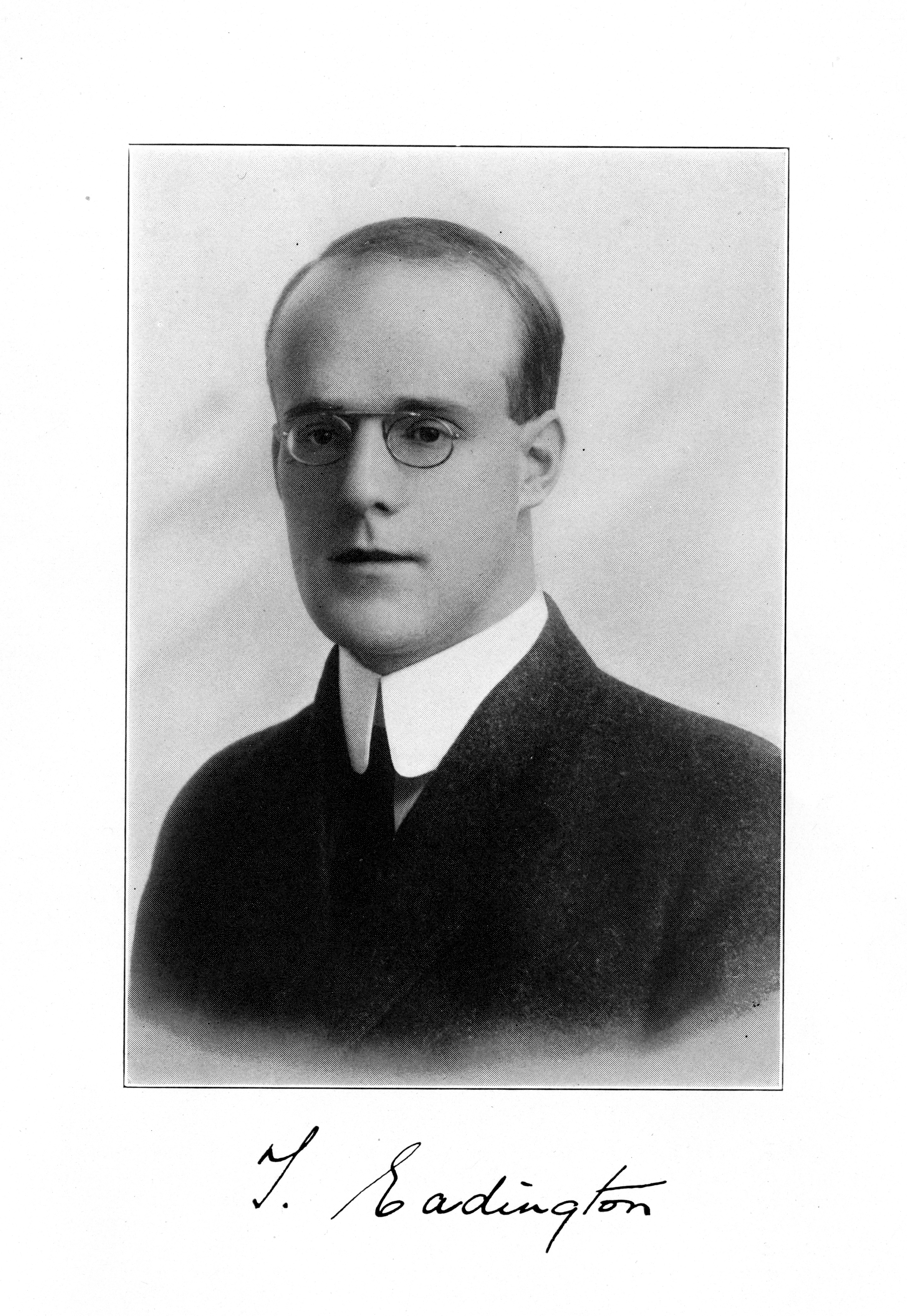 A black and white portrait photograph of Thomas Eadington Sr. in 1921. The bottom of the photo is signed T. Eadington.