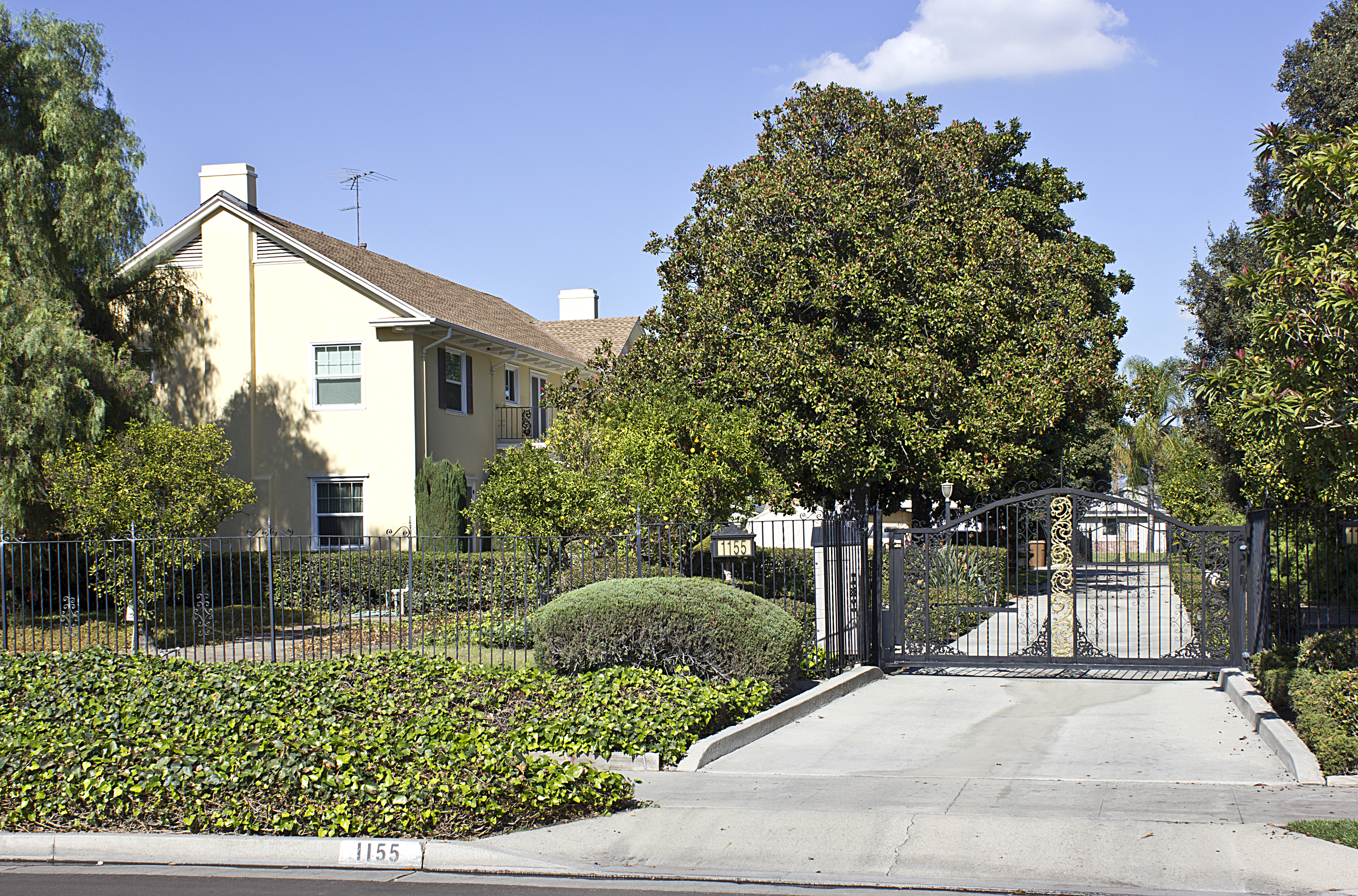 A colored photo of the view of the Lilburn Gardiner House from Orangethorpe Avenue in 2012.
