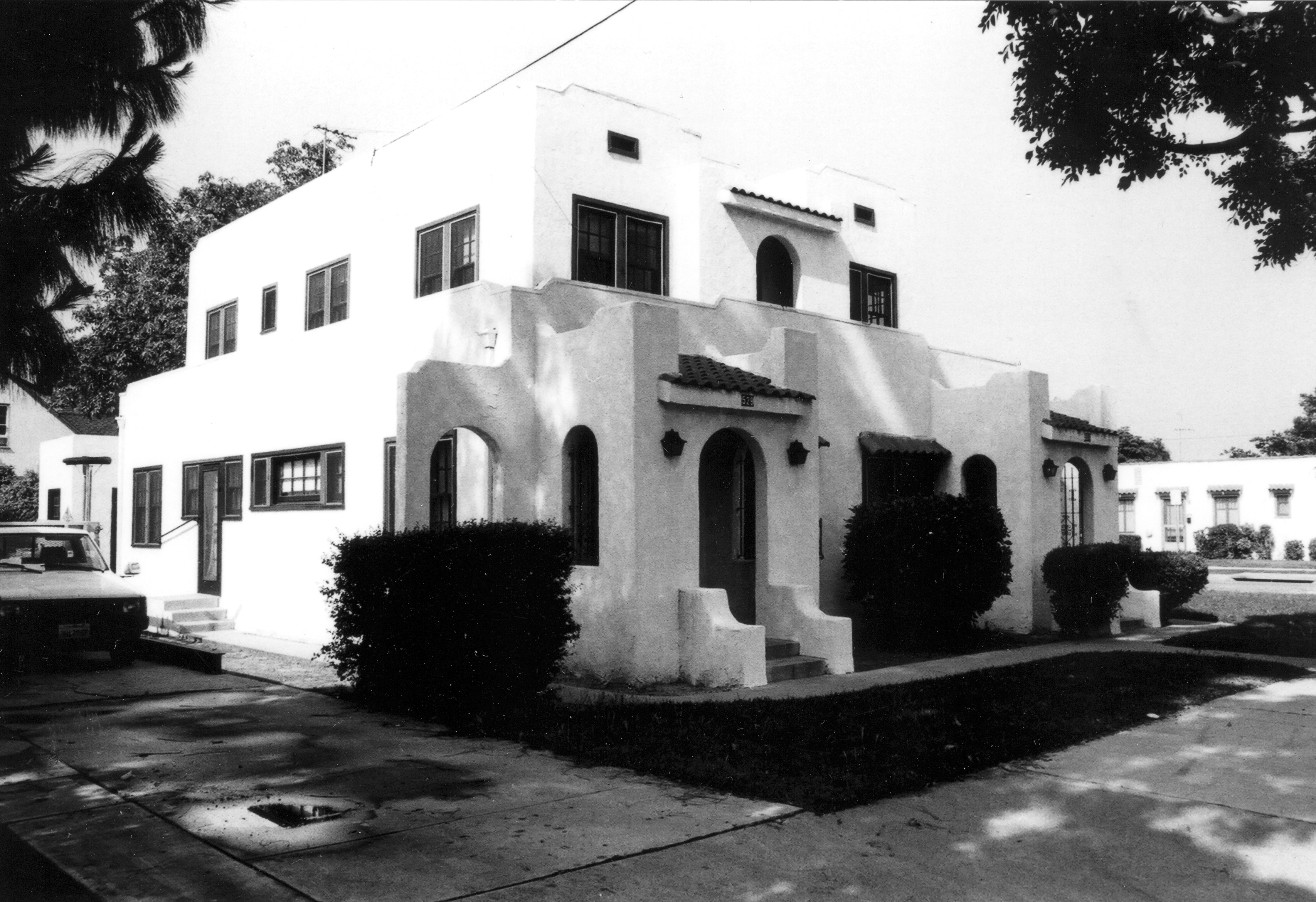 A black and white photograph of the west side exterior of the Jesse Ellis Apartments in 1971.