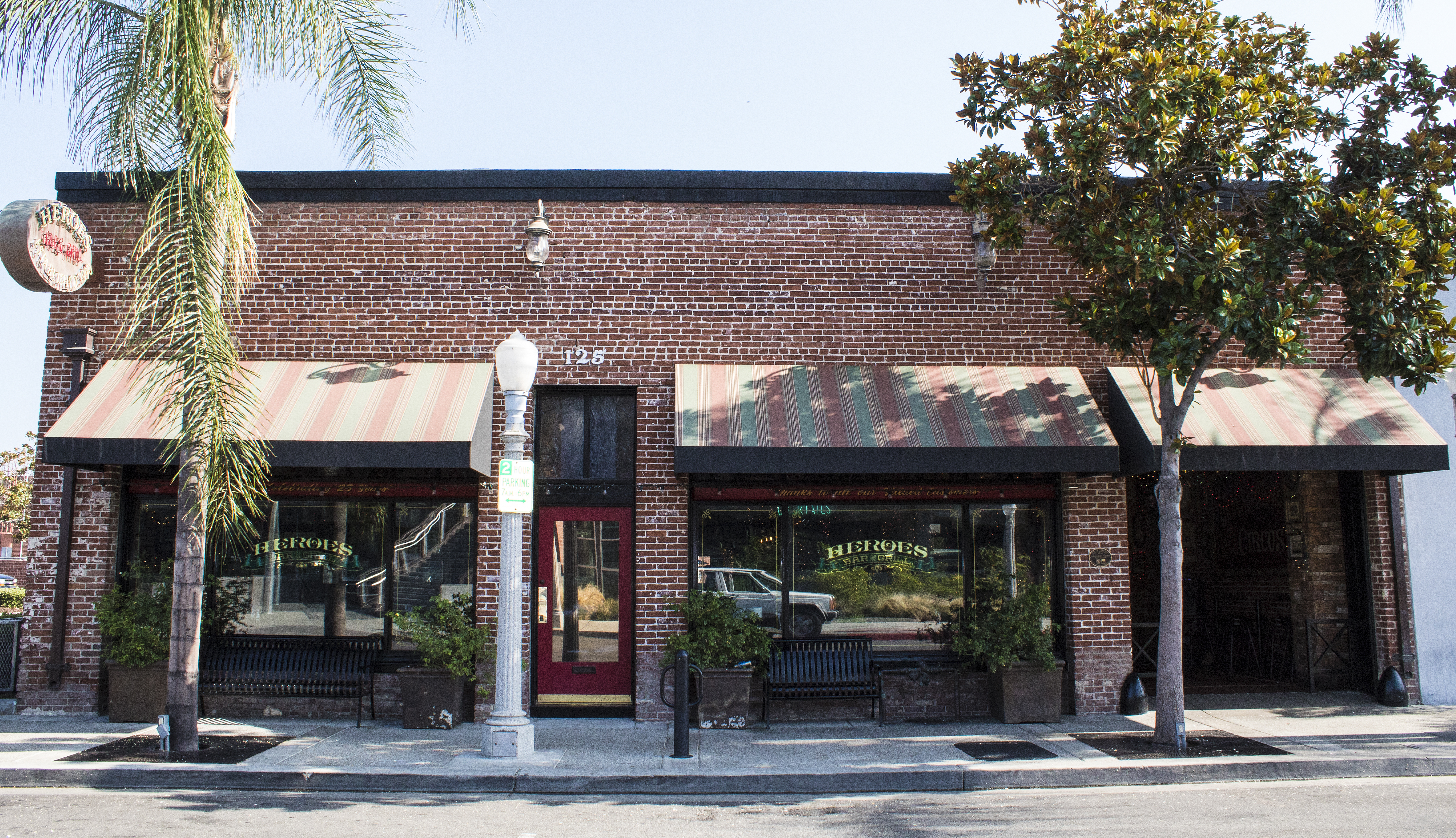 A colored photo of the John Reeder Gardiner Building (now Heroes Bar &amp; Grill) in 2017.