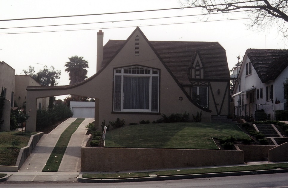 A colored photo of the exterior of the Model Home of 1927 in 1979.