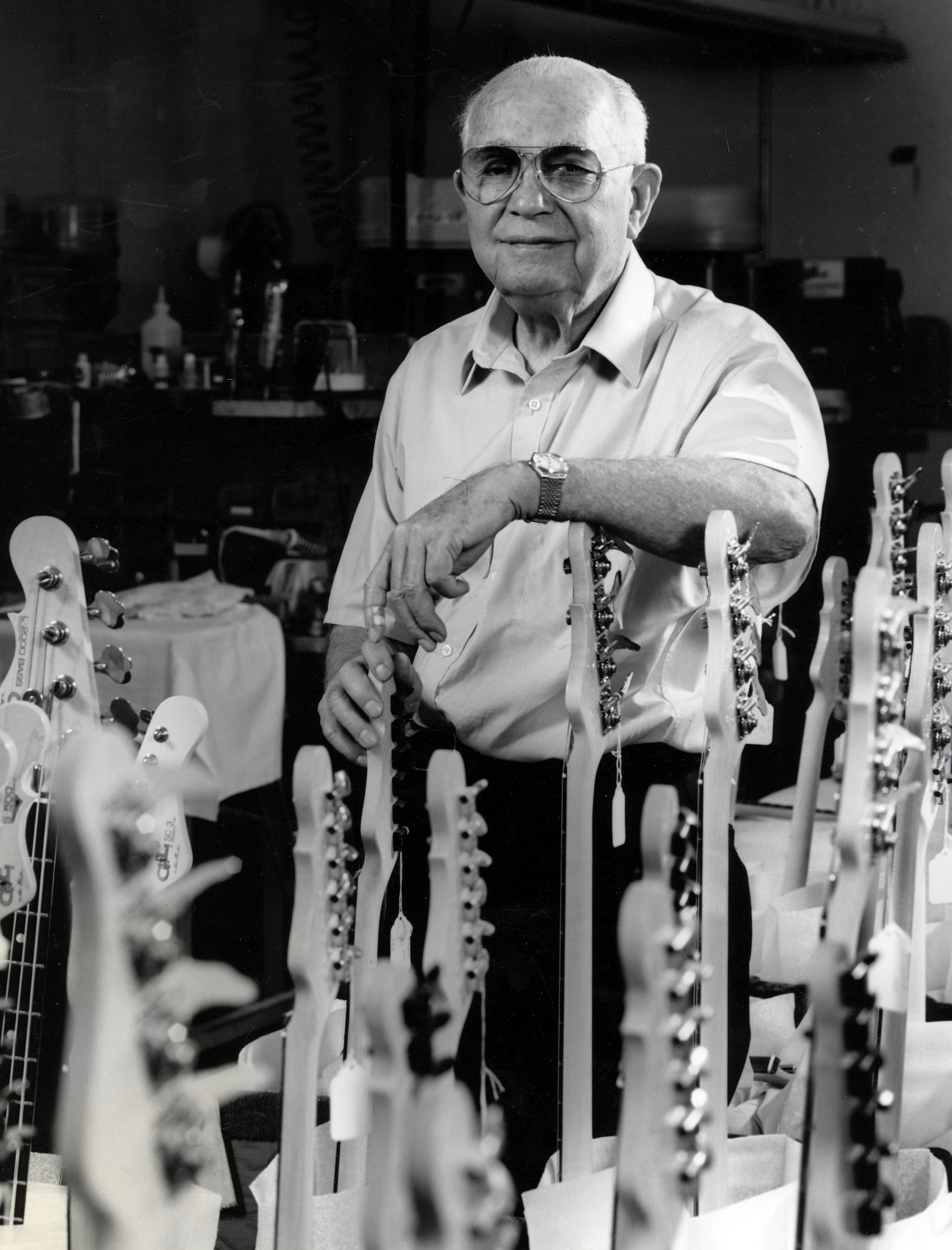 A black and white photograph of Leo Fender circa 1955.