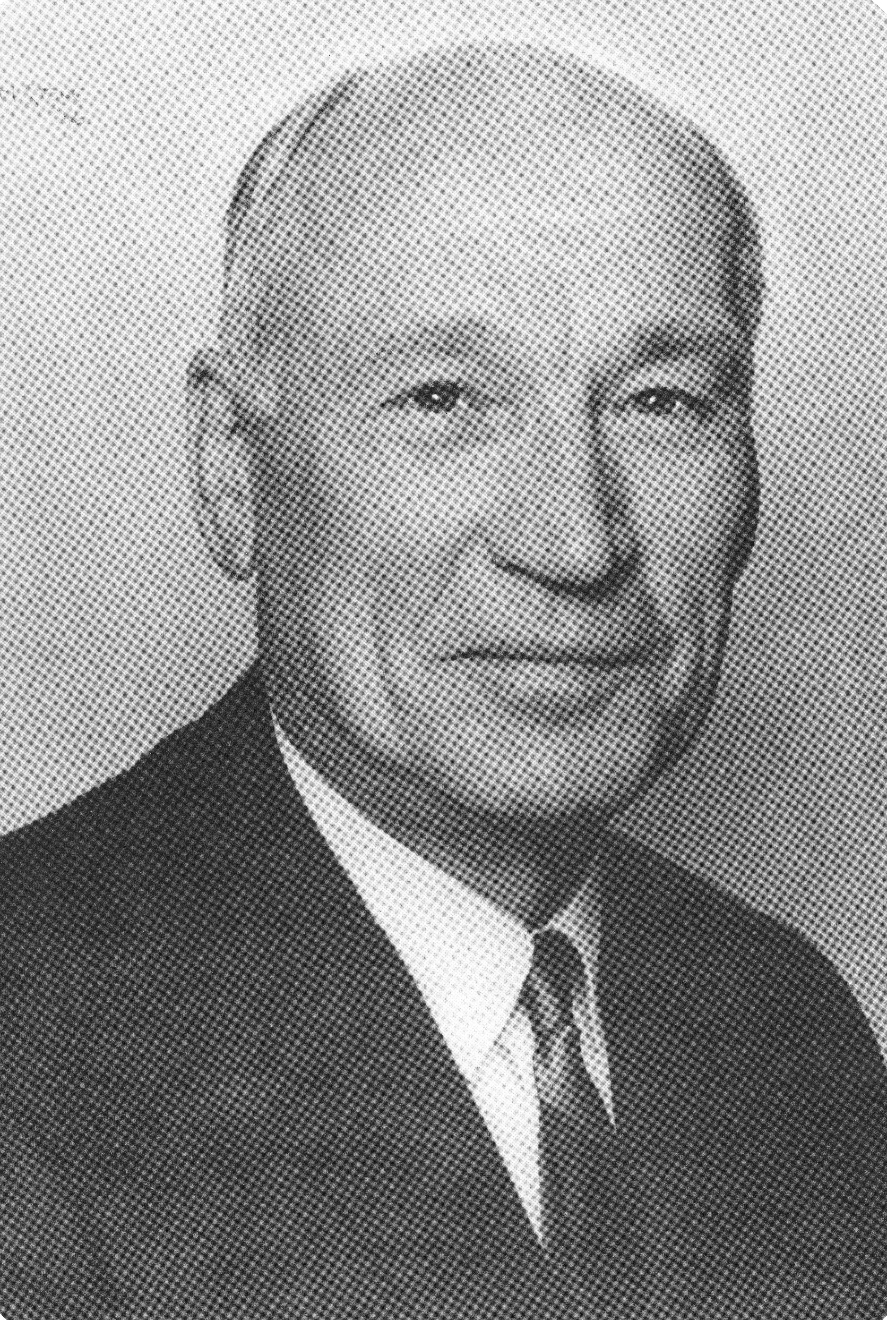 A black and white portrait photograph of Arnold Beckman.