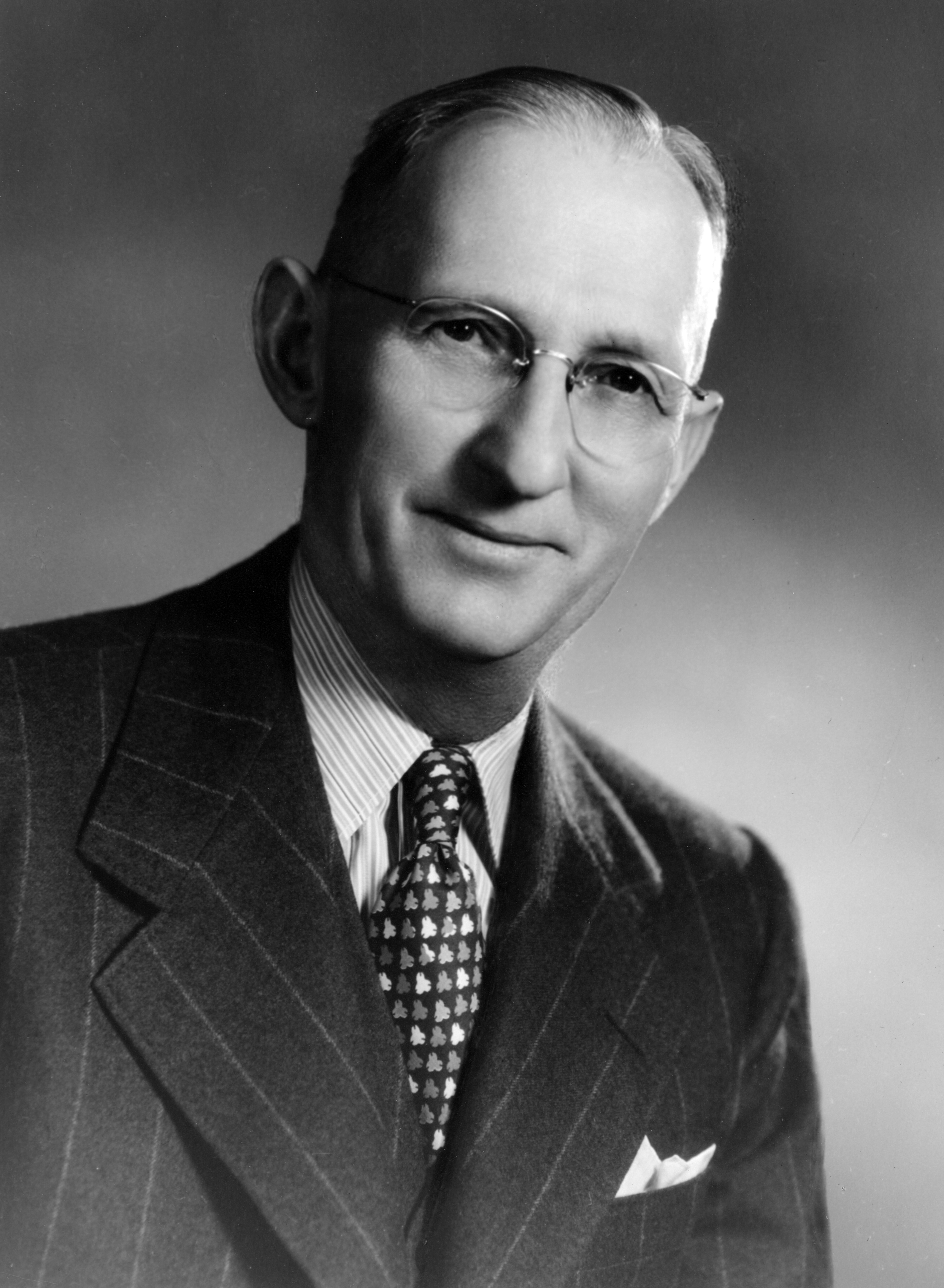 A black and white portrait photograph of Clarence Spencer.
