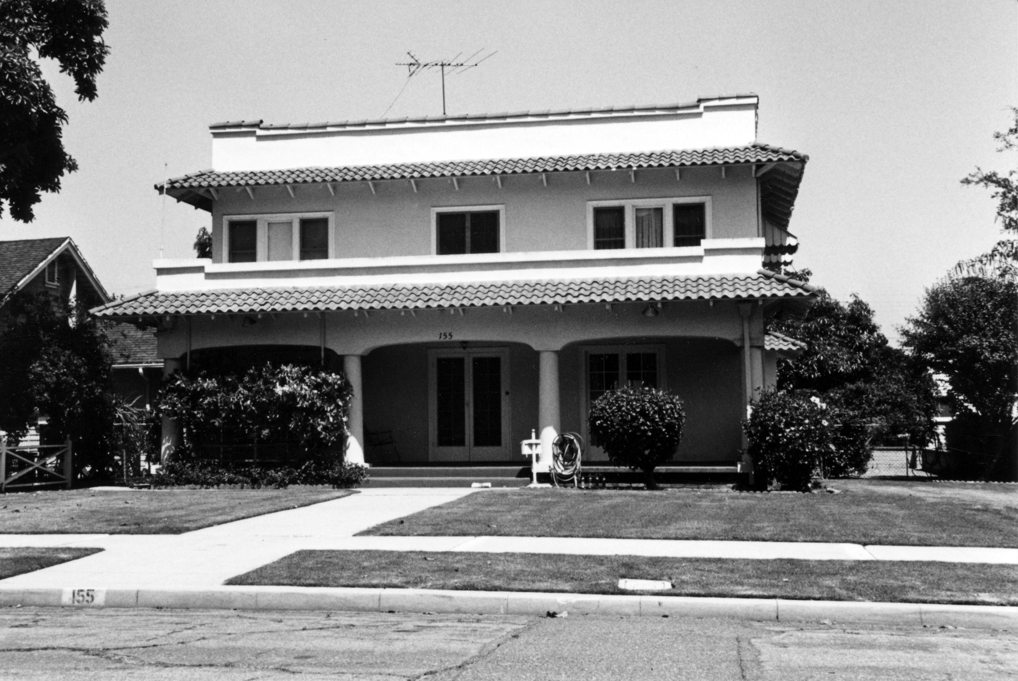 A black and white photograph of the front exterior of the Anita Shepardson House in 1993.