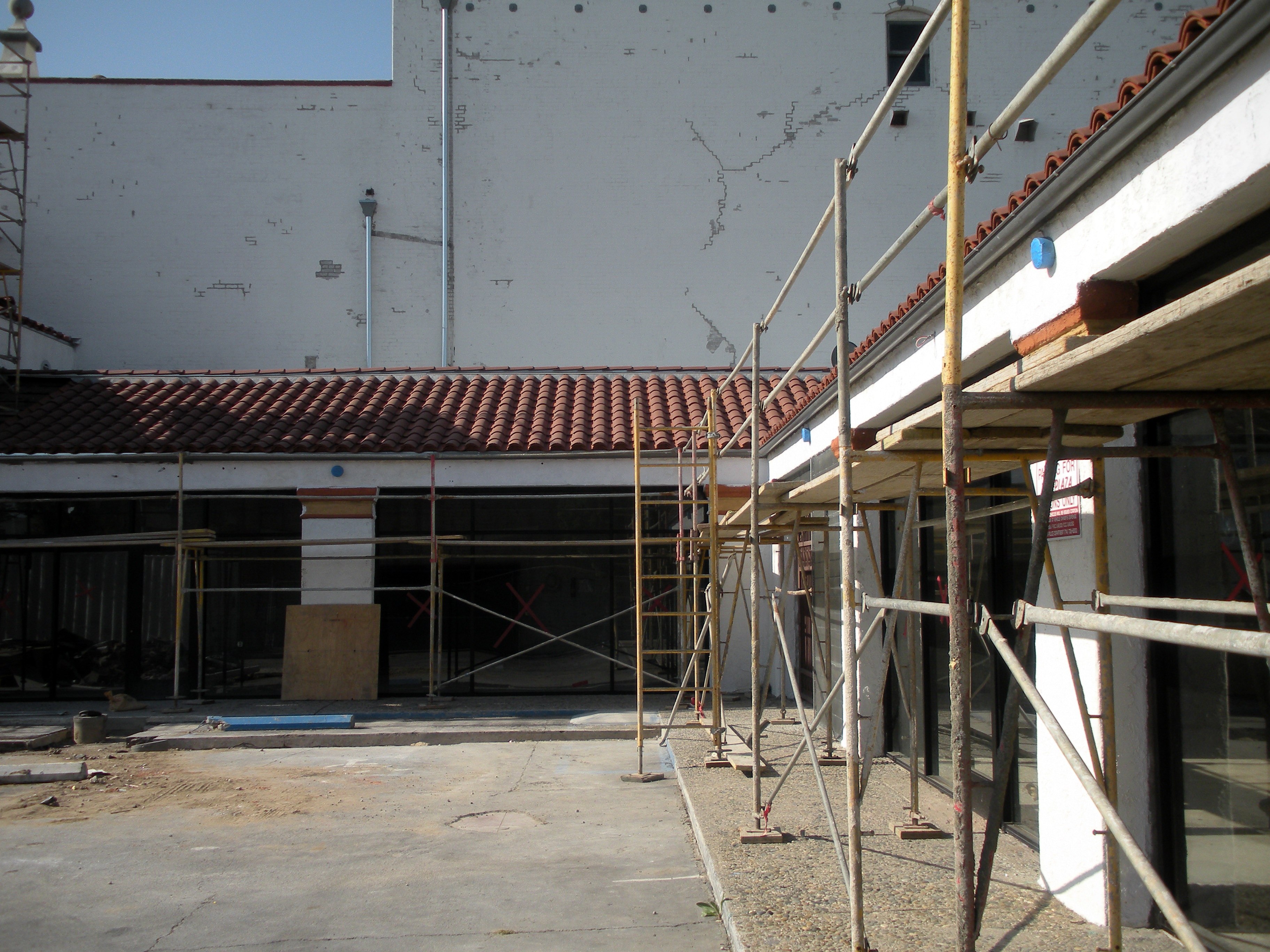 A colored photo of the Firestone Tire Service Building being remodeled in 2012.