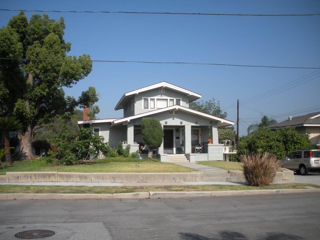 A colored photo of the Louis Plummer House exterior in 2014 before the remodel.