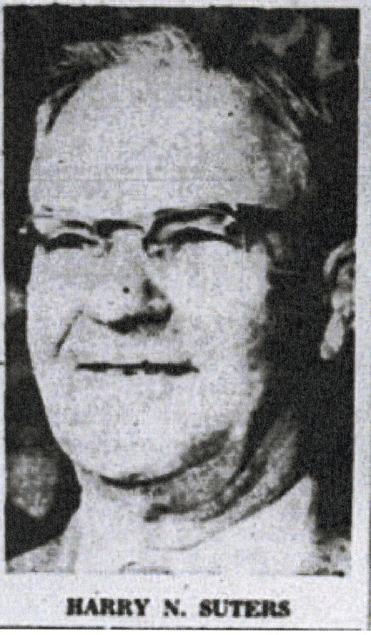 A black and white photograph of Harry Suters. The bottom of the photo reads: Harry N. Suters.