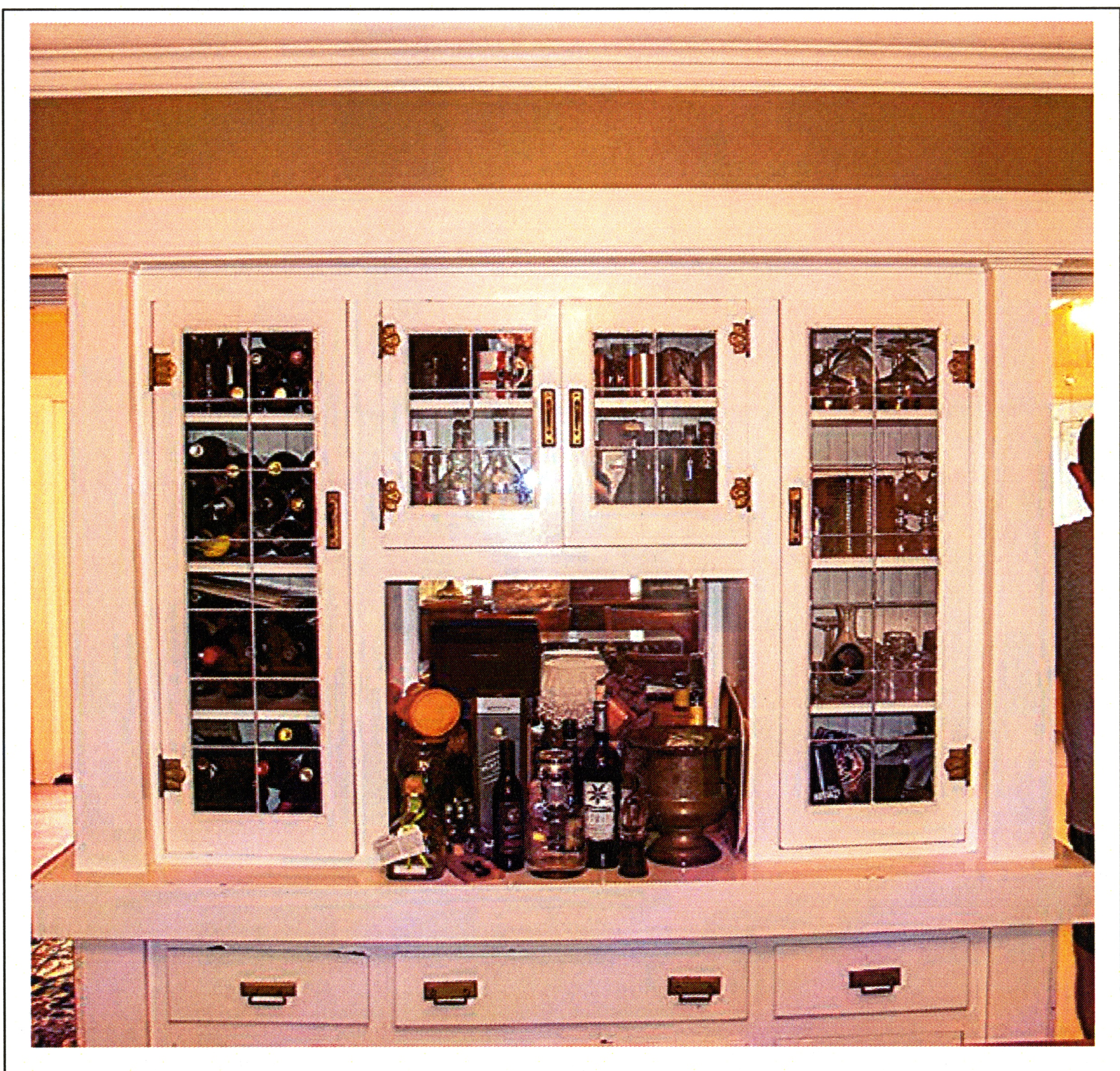 A colored photo of the original built-in cabinets inside the John Menges House in 2017.