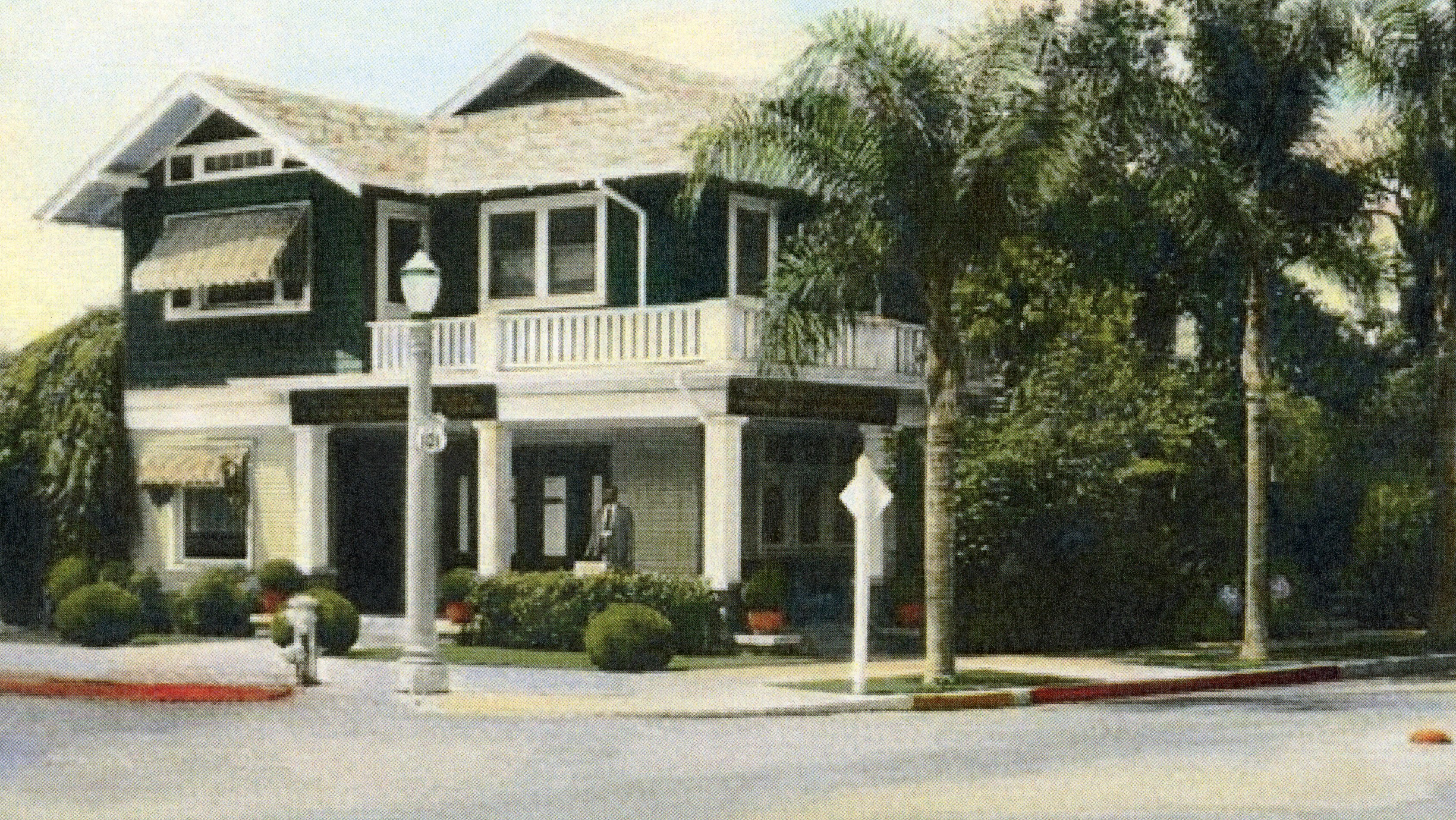 A colored photograph of the original mortuary for the Harry Suters House.