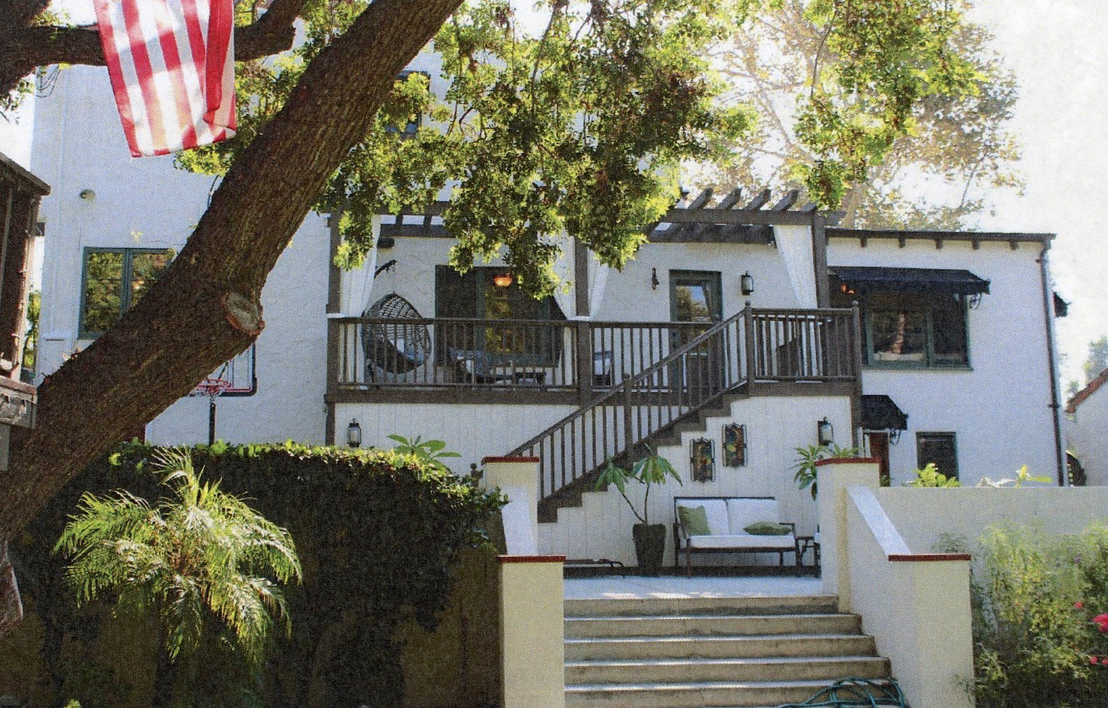 A colored photo of the rear of the Walter Joseph Cadman House in 2019.