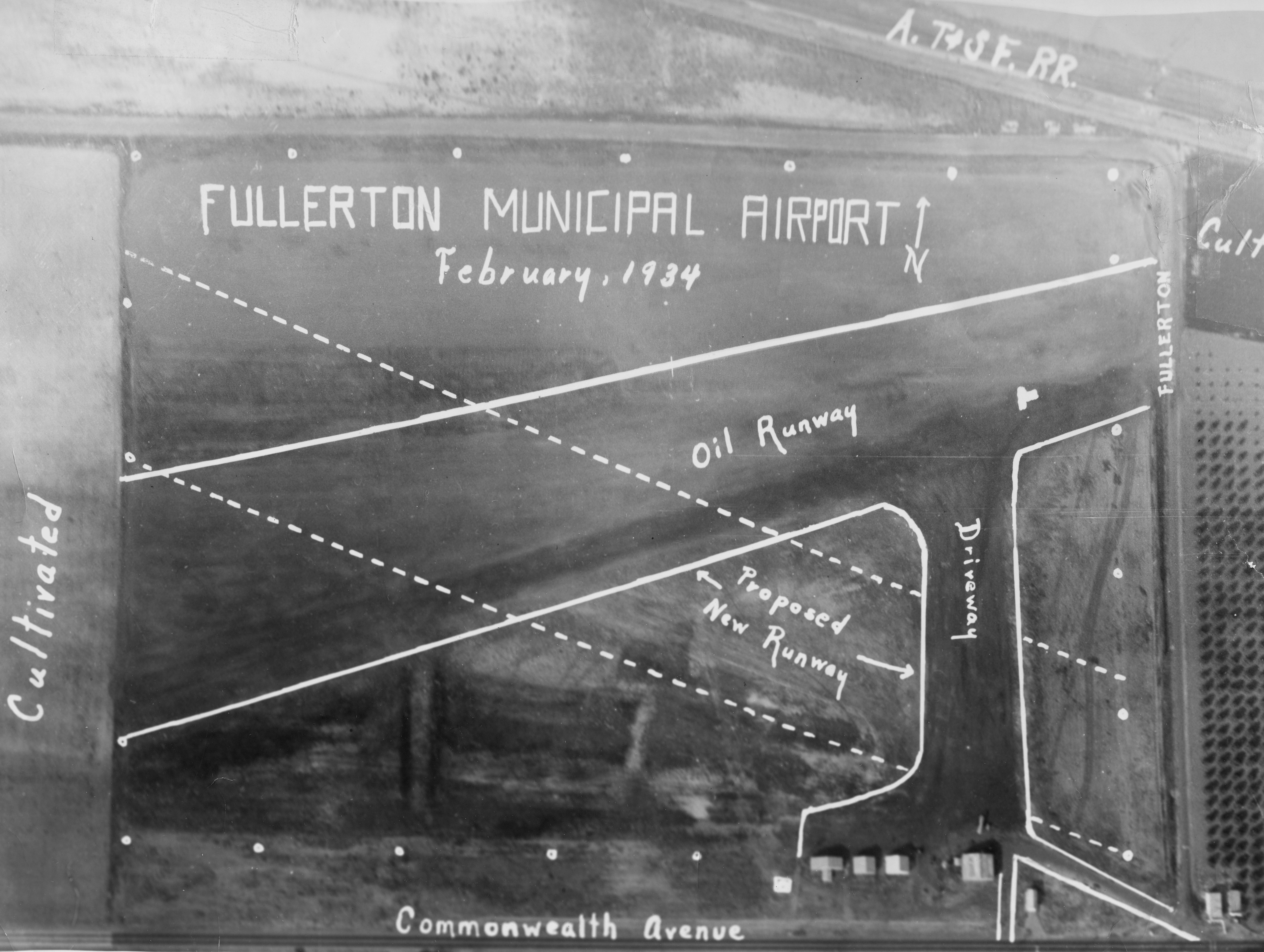 A digital scan of an aerial view of the Fullerton Municipal Airport runway in February 1934.