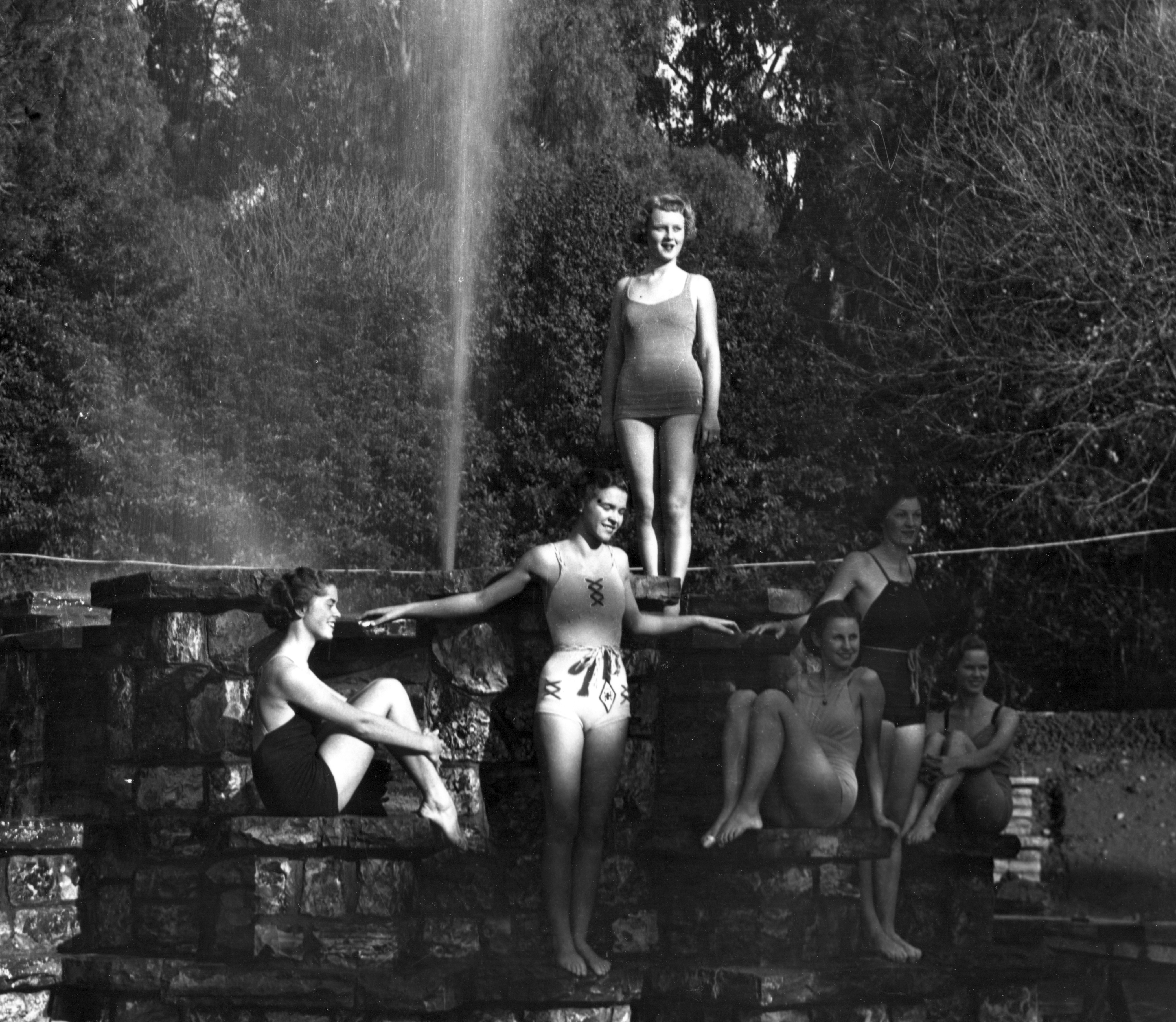 A black and white photograph of several women at the Hillcrest Park Fountain, taken in 1936.