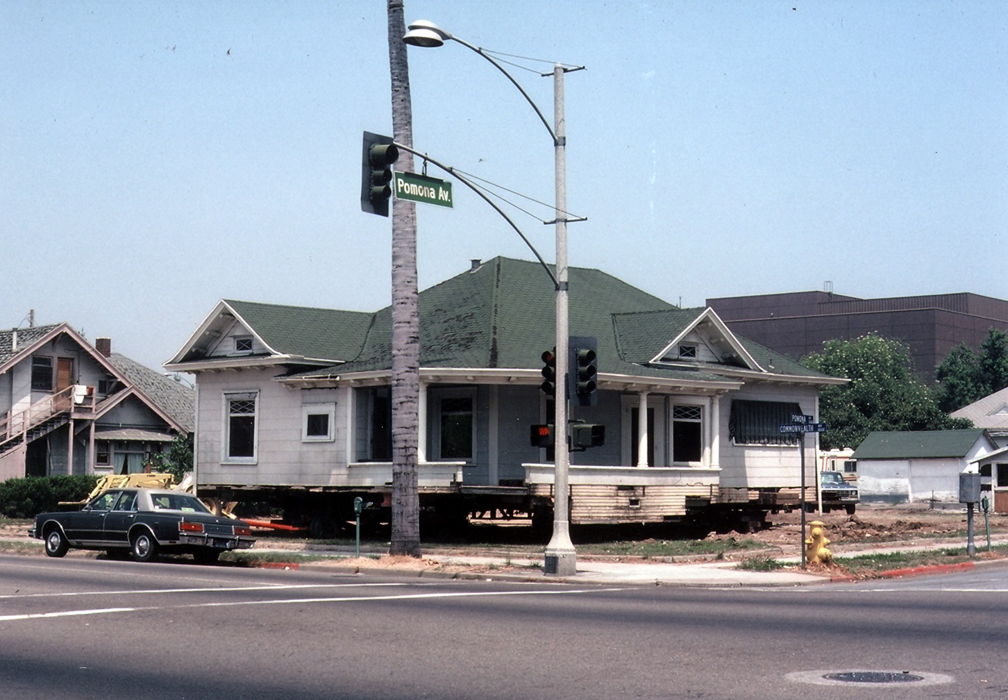 A colored photo of the Meredith Conway House on Commonwealth Avenue ready to be moved to Marion Boulevard. The photo was taken in 1980.