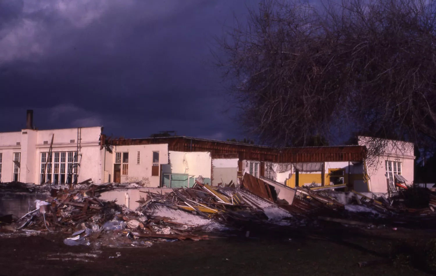 A colored photo of the demolished Ford Elementary School in 1984.