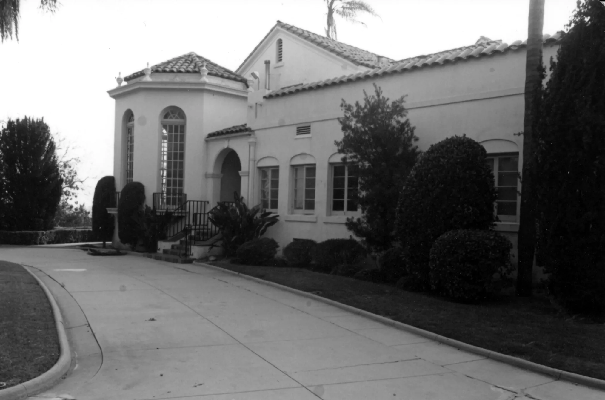 A black and white photo of the driveway on the east side of the Muckenthaler building, taken in 1978.