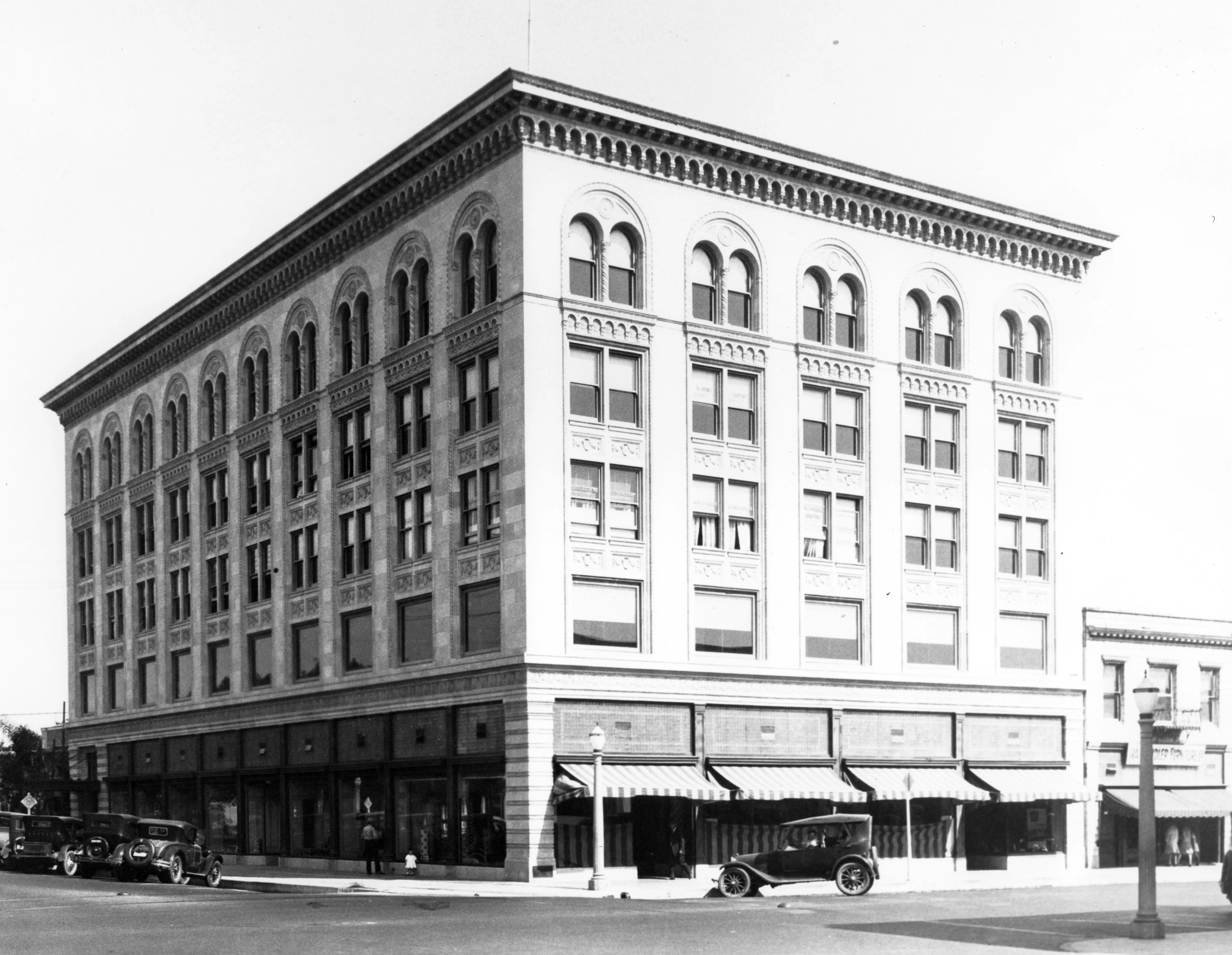 A black and white photograph of the Chapman Building&#039;s early exterior circa 1923.