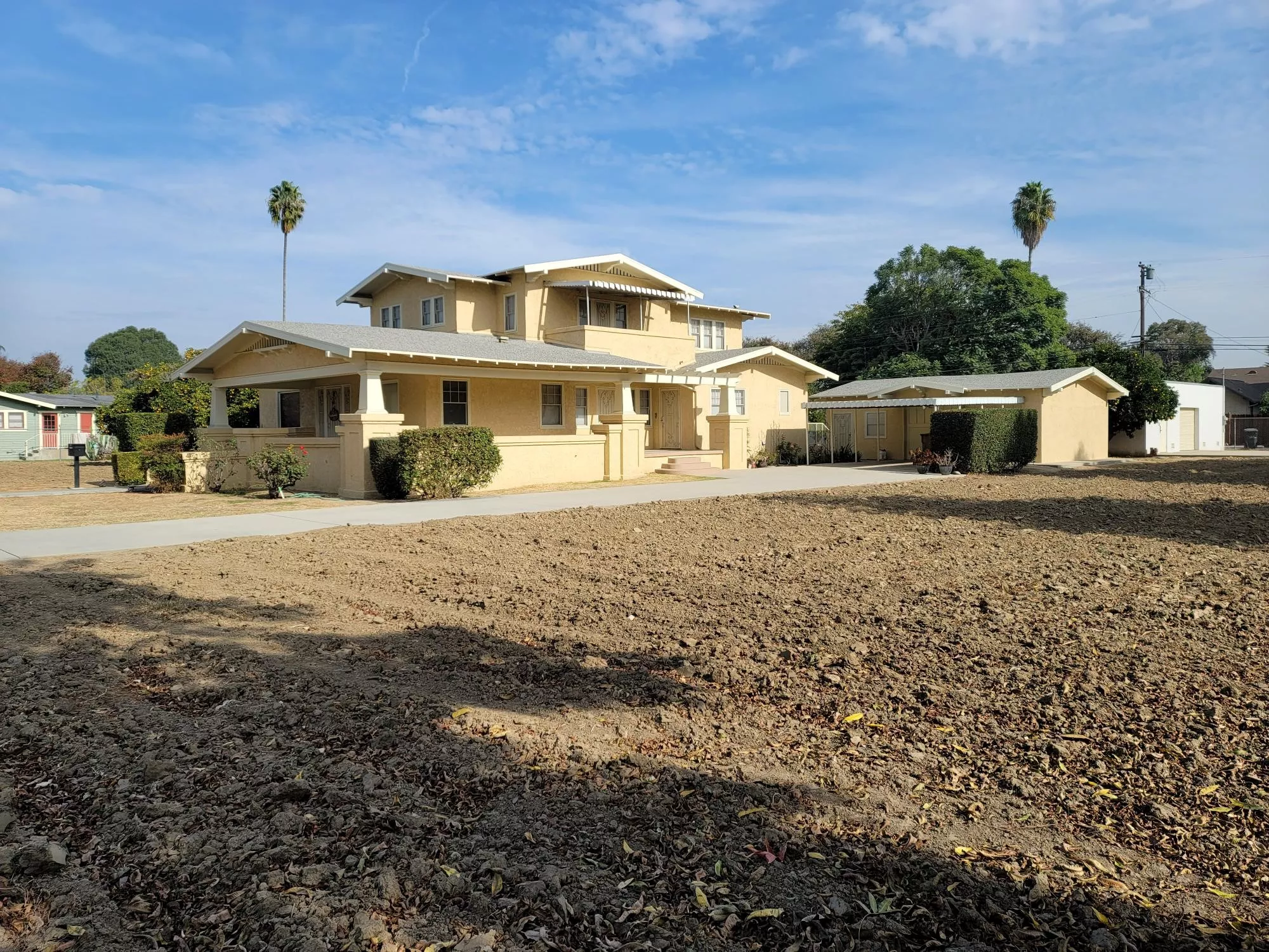A colored photo of the Herman Otto House&#039;s exterior looking northeast in 2024.