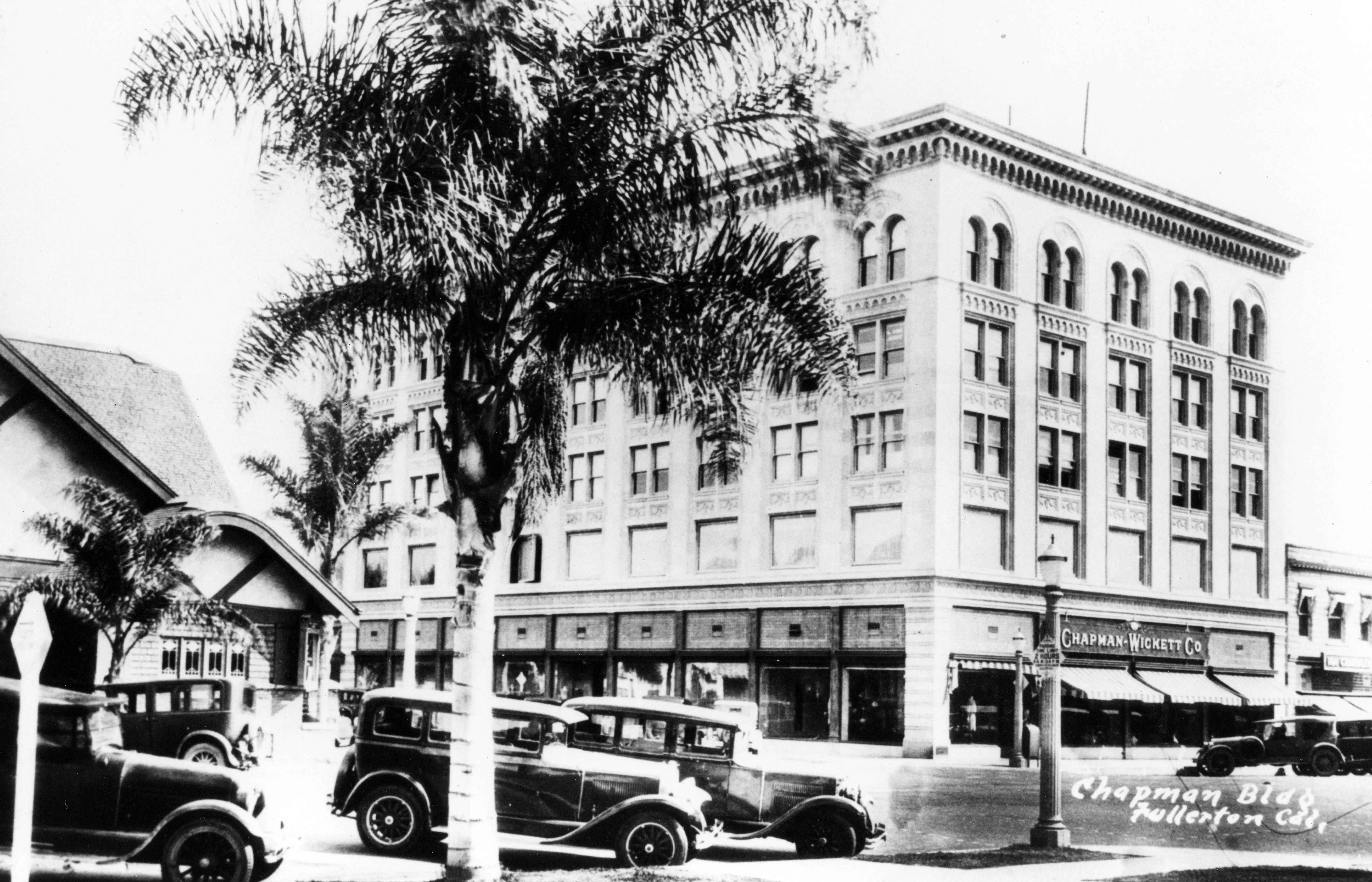 A black and white photograph of the Chapman Building&#039;s exterior circa 1928.