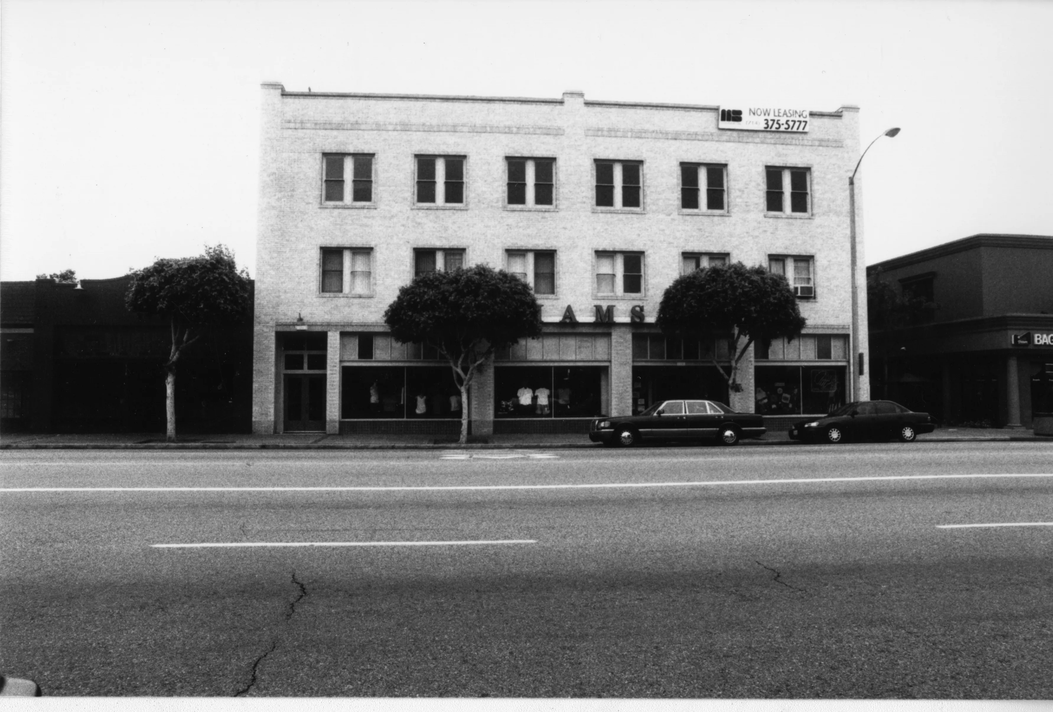 A black and white photograph of the exterior of the Odd Fellows Temple in 2001.