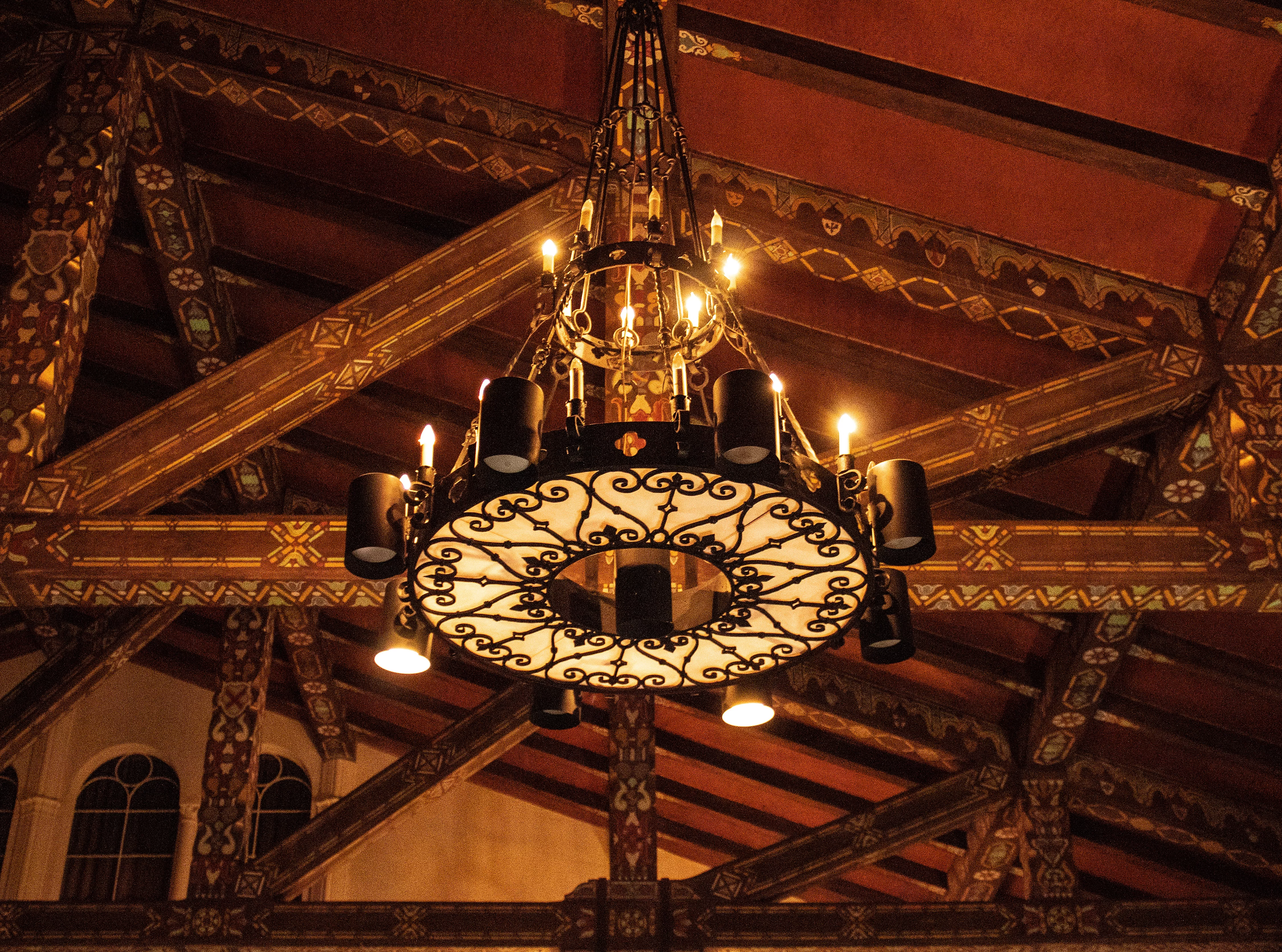A colored photo of the interior light fixture inside the Fullerton Union High School Auditorium, taken in 2021.