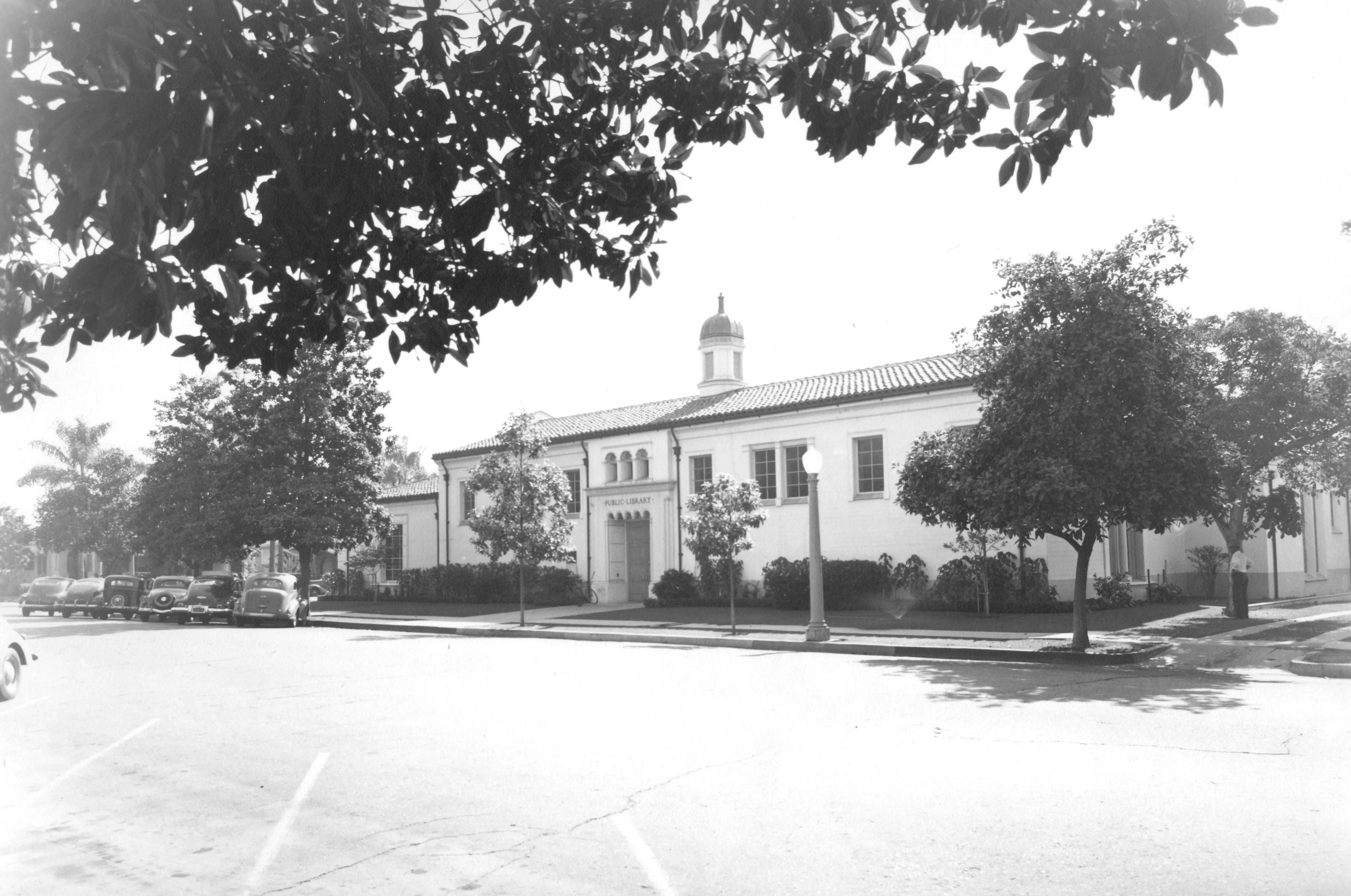 A black and white photograph of the Fullerton Library&#039;s entrance on the east side of the building, taken in 1942.